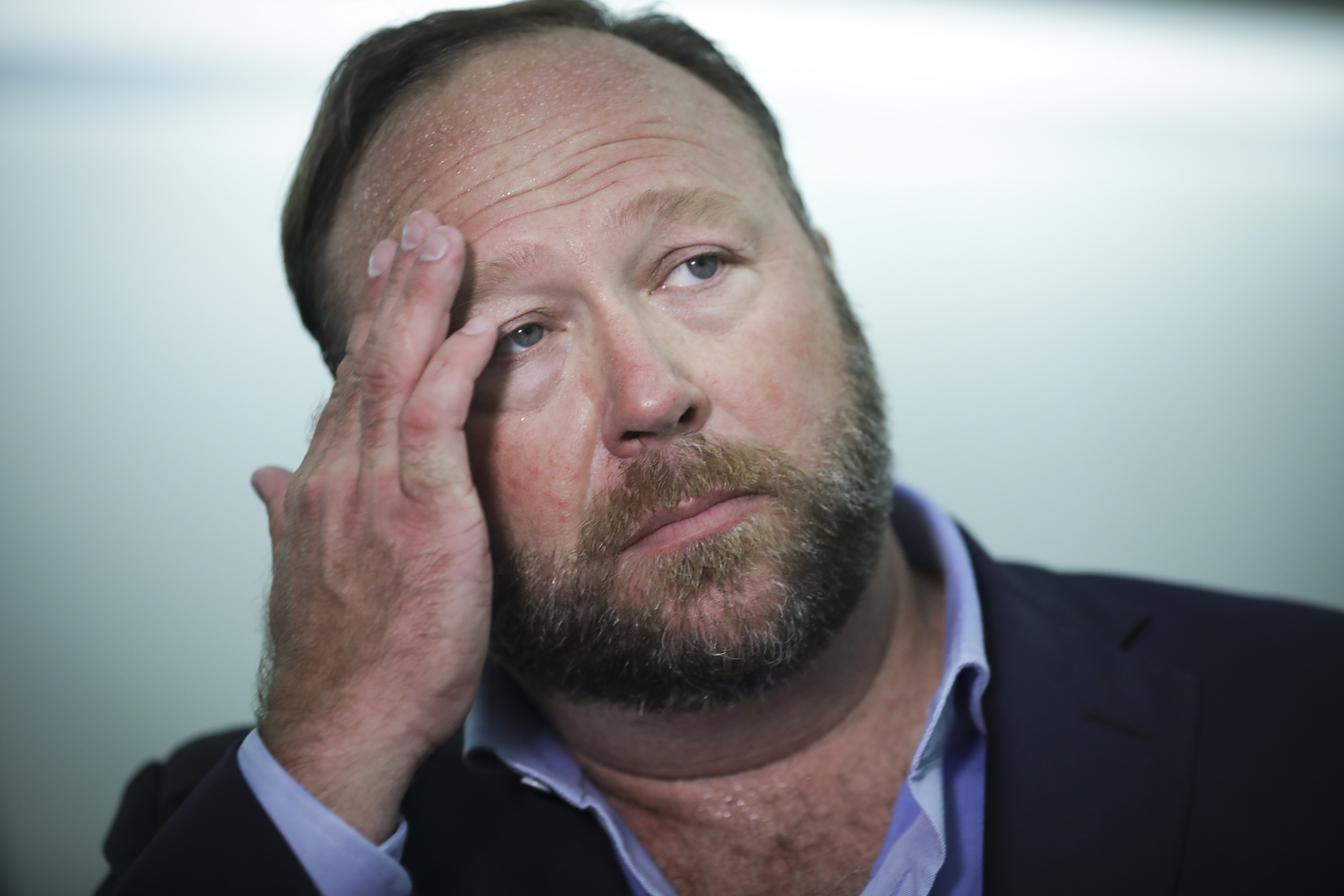Conspiracy theorist Alex Jones filed for Chapter 11 bankruptcy Friday.