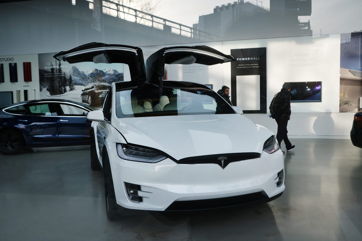 A white Tesla car