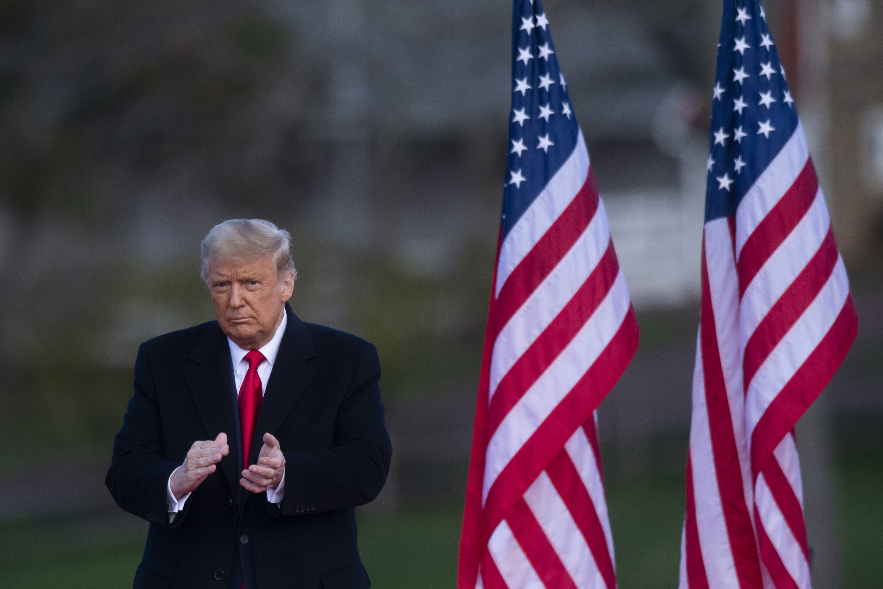 Donald Trump acknowledges supporters after holding a campaign rally