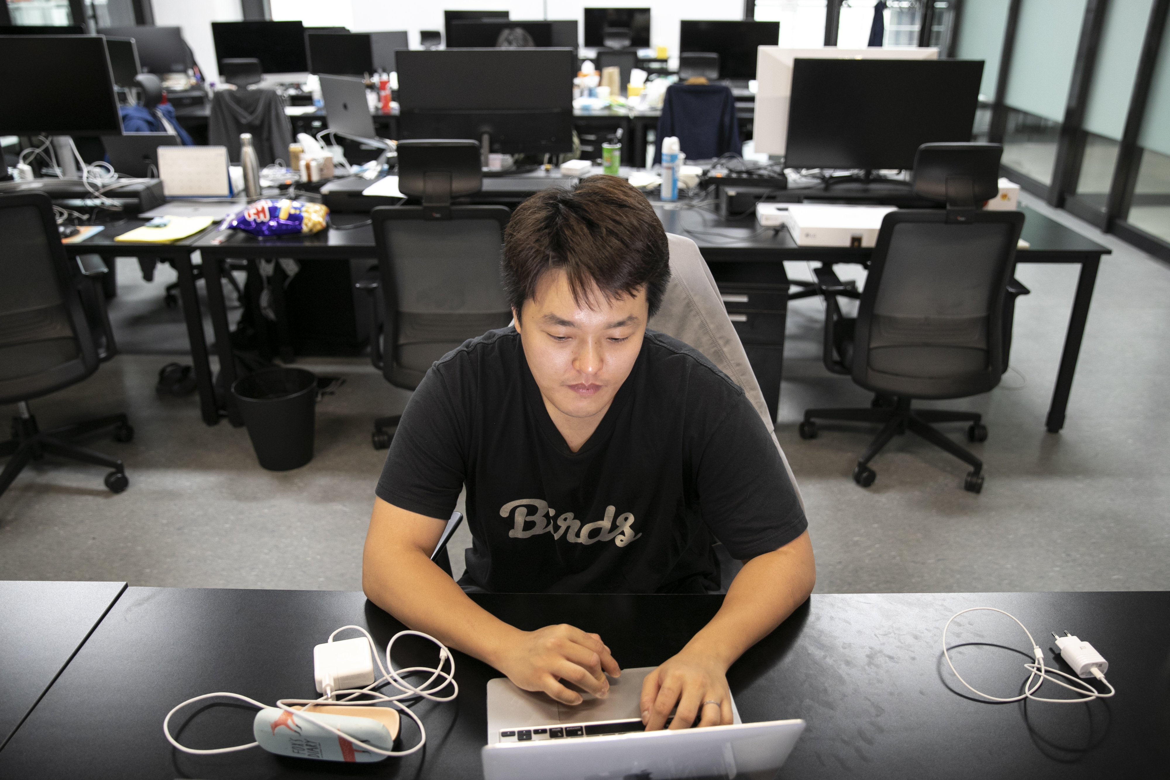 Do Kwon, co-founder and chief executive officer of Terraform Labs, works on his laptop in the company's office in Seoul, South Korea, on April 14, 2022.