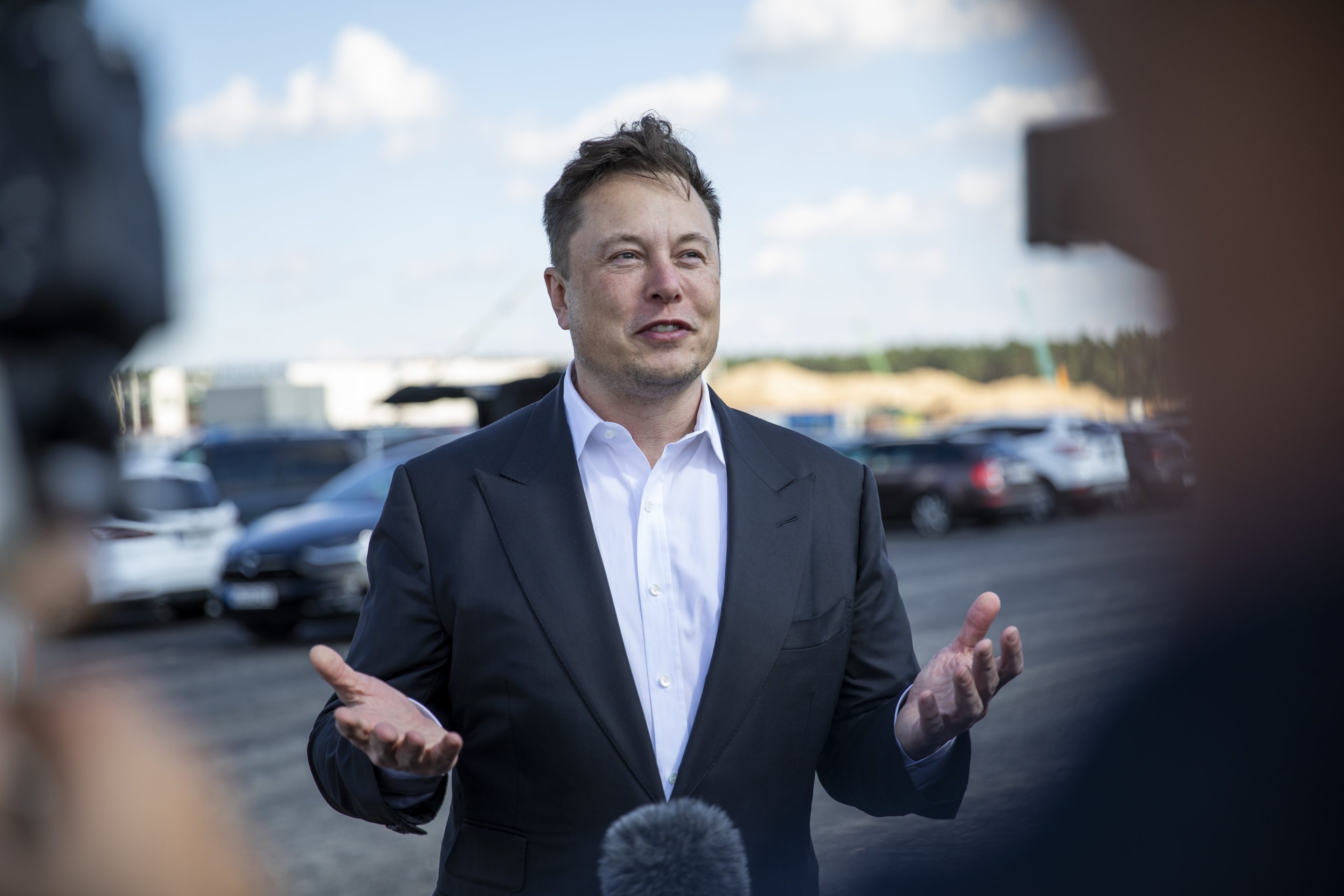Tesla CEO Elon Musk talks to the press at the construction site of the new Tesla Gigafactory near Berlin on September 03, 2020 near Gruenheide, Germany.