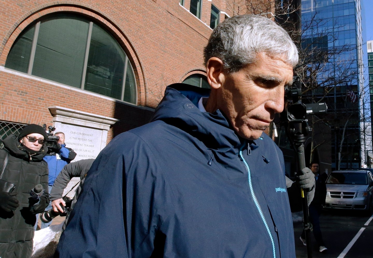 William "Rick" Singer founder of the Edge College & Career Network, departs federal court in Boston.