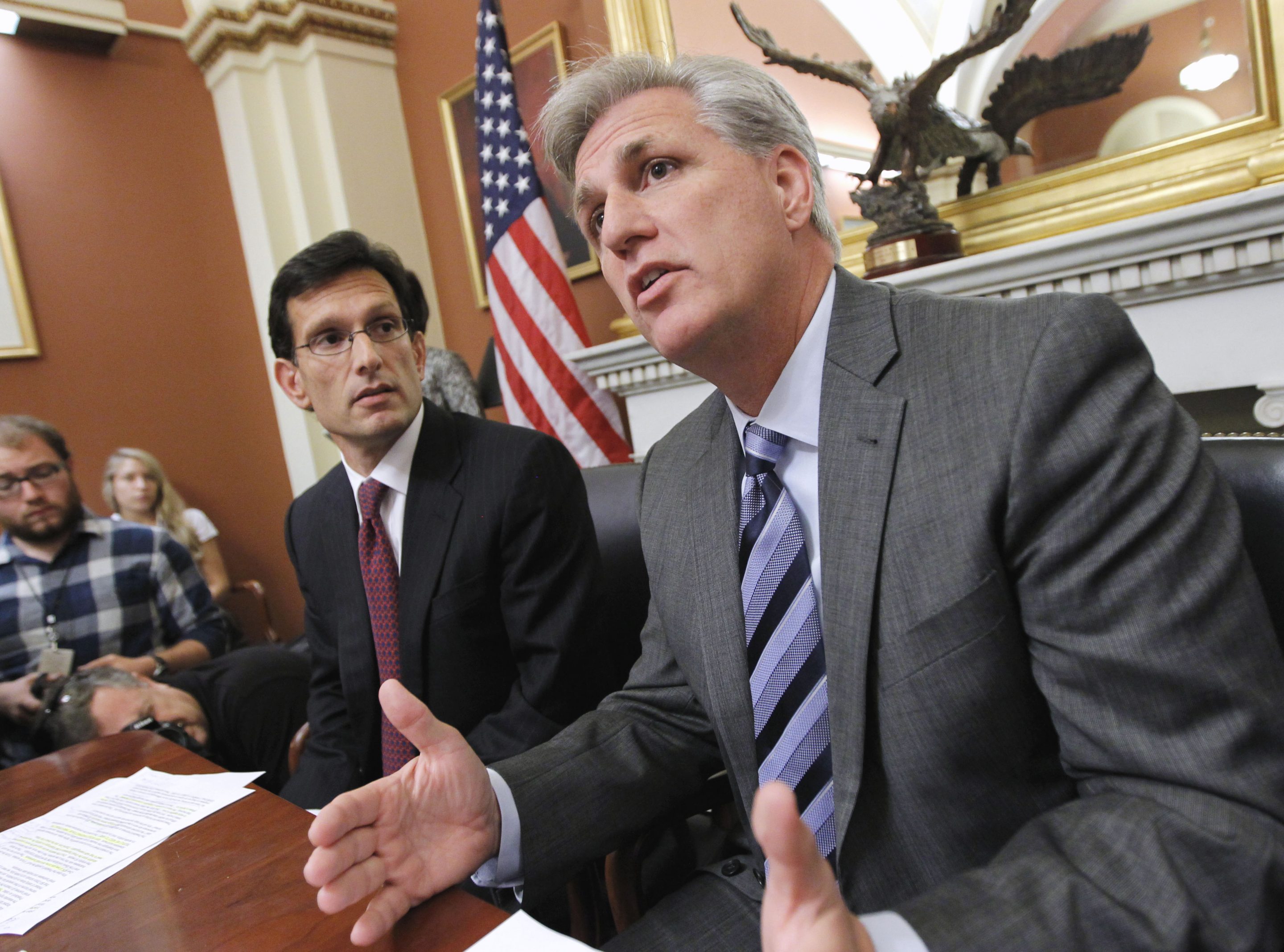 Then-House Majority Whip Kevin McCarthy of Calif., right, joined by House Majority Leader Eric Cantor of Va., speaks to reporters about President Obama's debt reduction plan and other issues, on Capitol Hill in Washington, on Sept. 20, 2013.