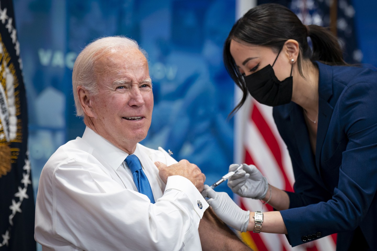 U.S. President Joe Biden receives a booster dose of the COVID-19 vaccine targeting the Omicron BA.4/BA.5 subvariants in the Eisenhower Executive Office Building in Washington, D.C., on Oct. 25. The U.S. Food and Drug Administration is seeking to simplify the COVID vaccine regimen, potentially moving to annual boosters similar to those given for the flu, the federal agency said in a Monday report.