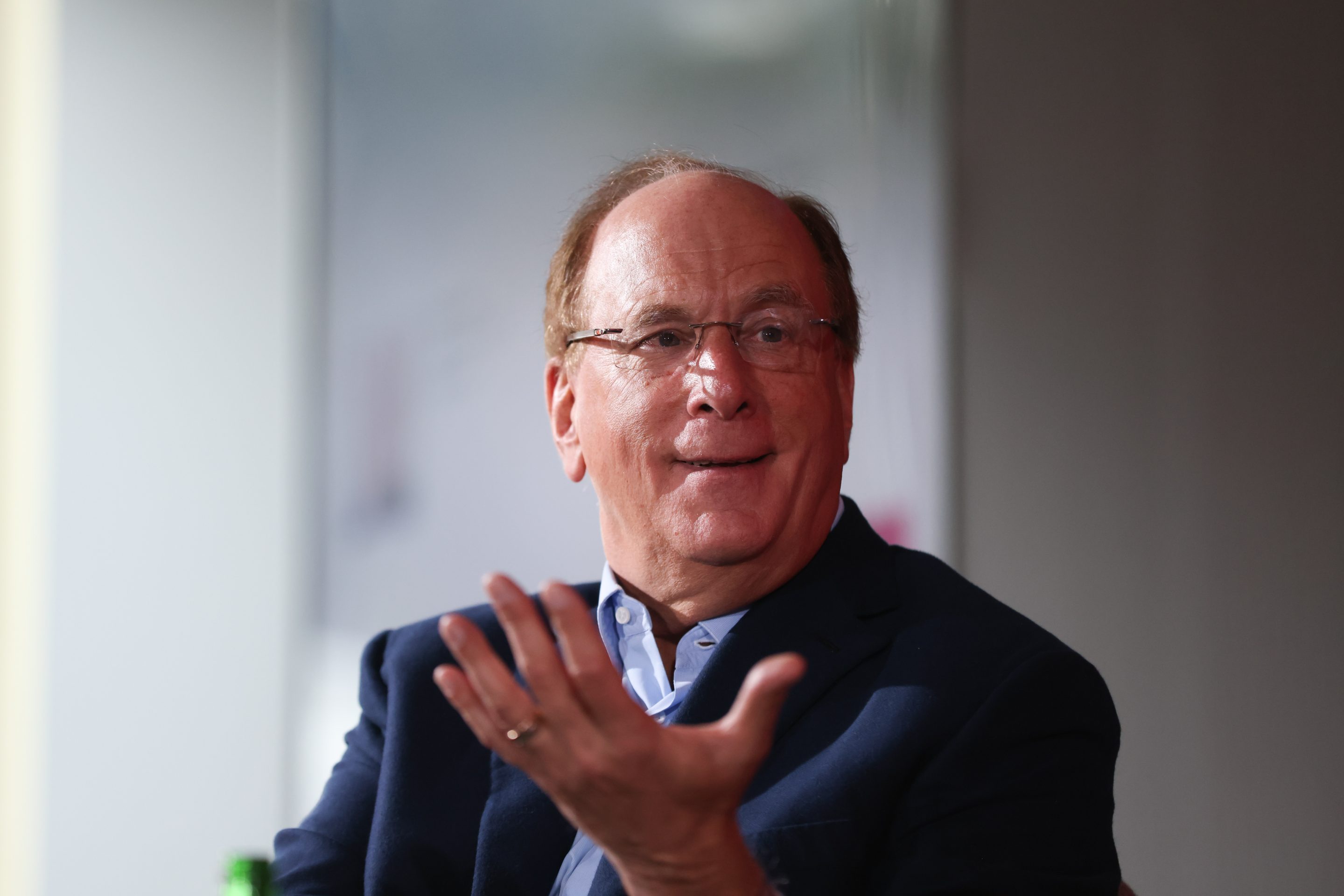 Larry Fink, chairman and chief executive officer of BlackRock, speaks at event on the sidelines of the opening day of the World Economic Forum (WEF) in Davos, Switzerland, on Tuesday, Jan. 17, 2023.