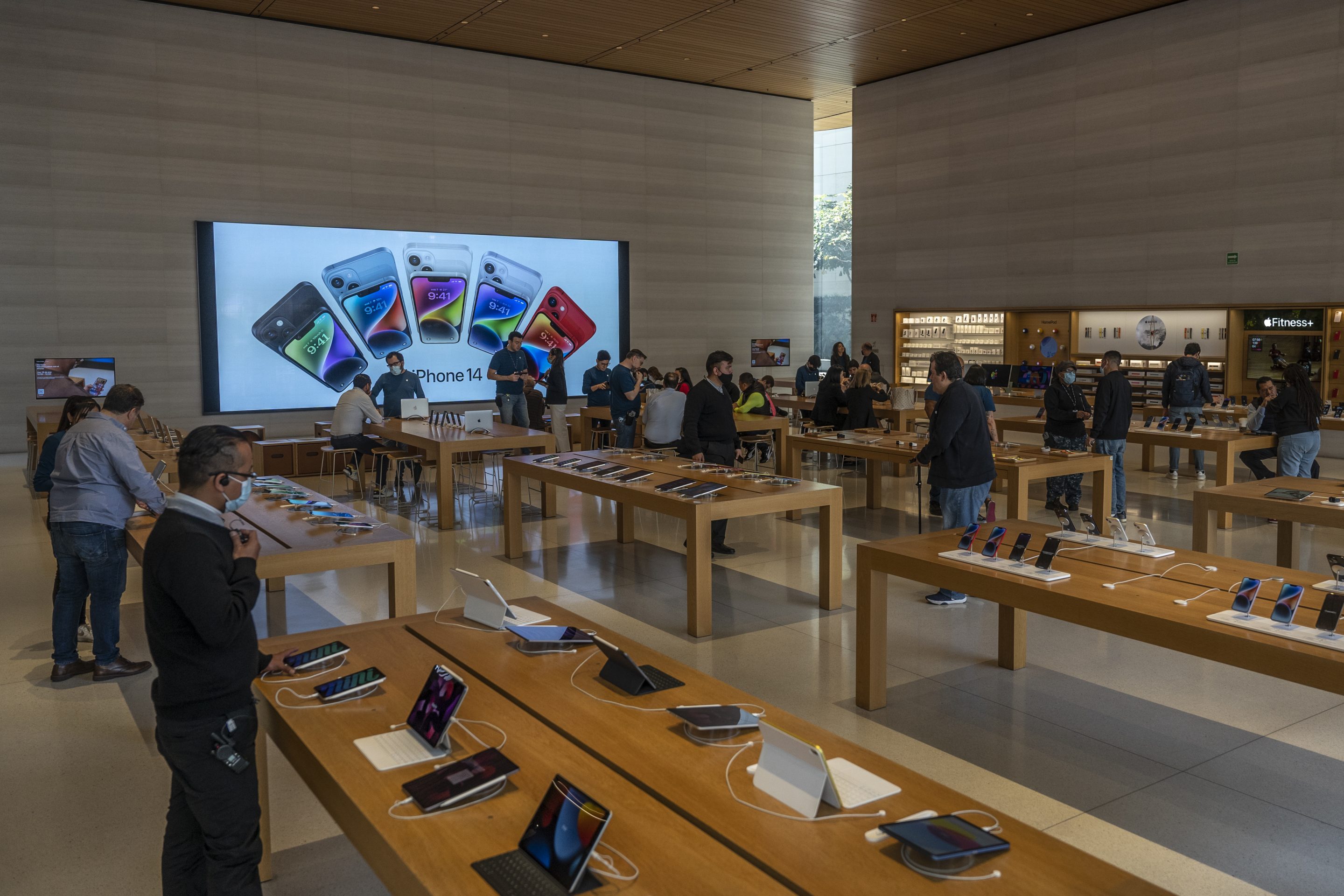 Customers shop at an Apple store in Mexico City, Mexico, on Thursday, Jan. 19, 2023.