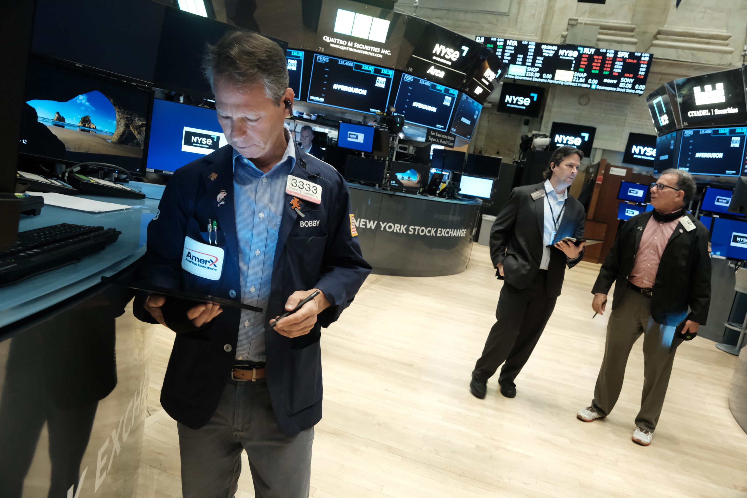 Traders work on the floor of the New York Stock Exchange (NYSE) on May 12.