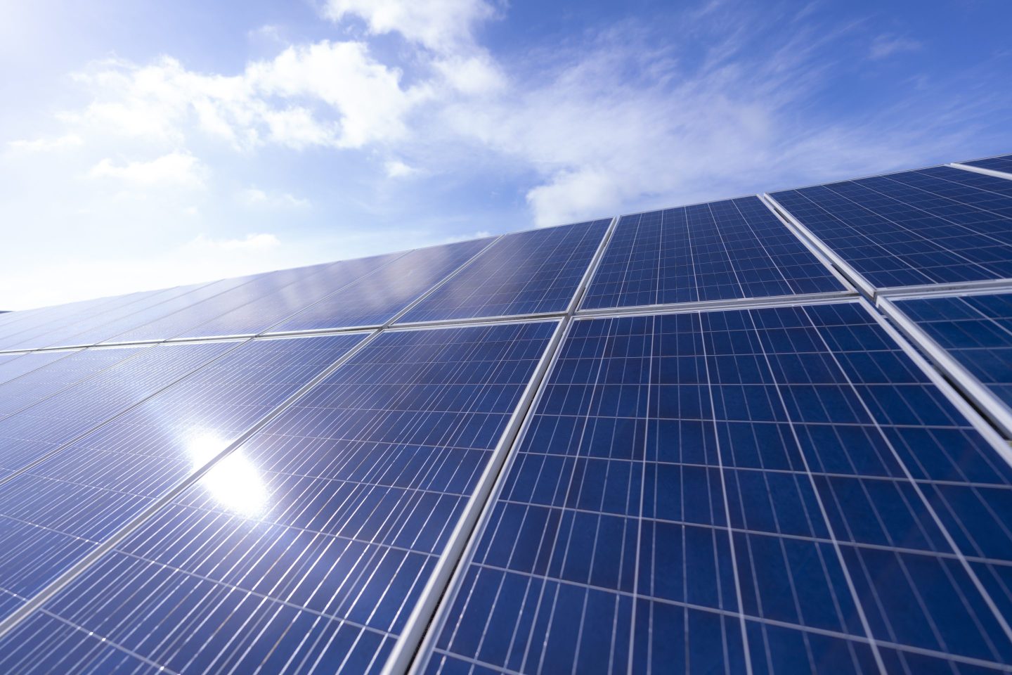 Solar panels in front of a clear sky