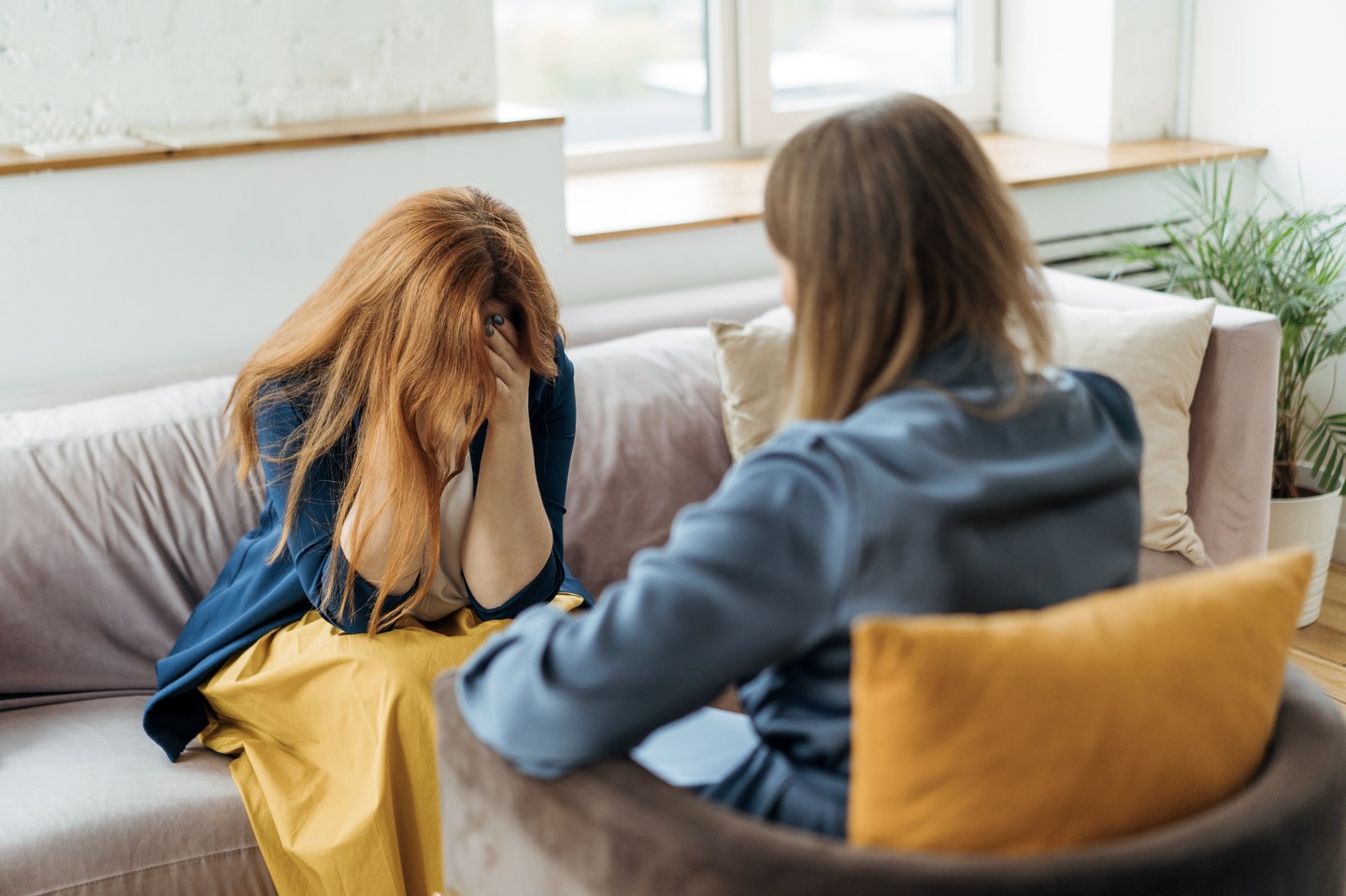 Two women having a conversation.