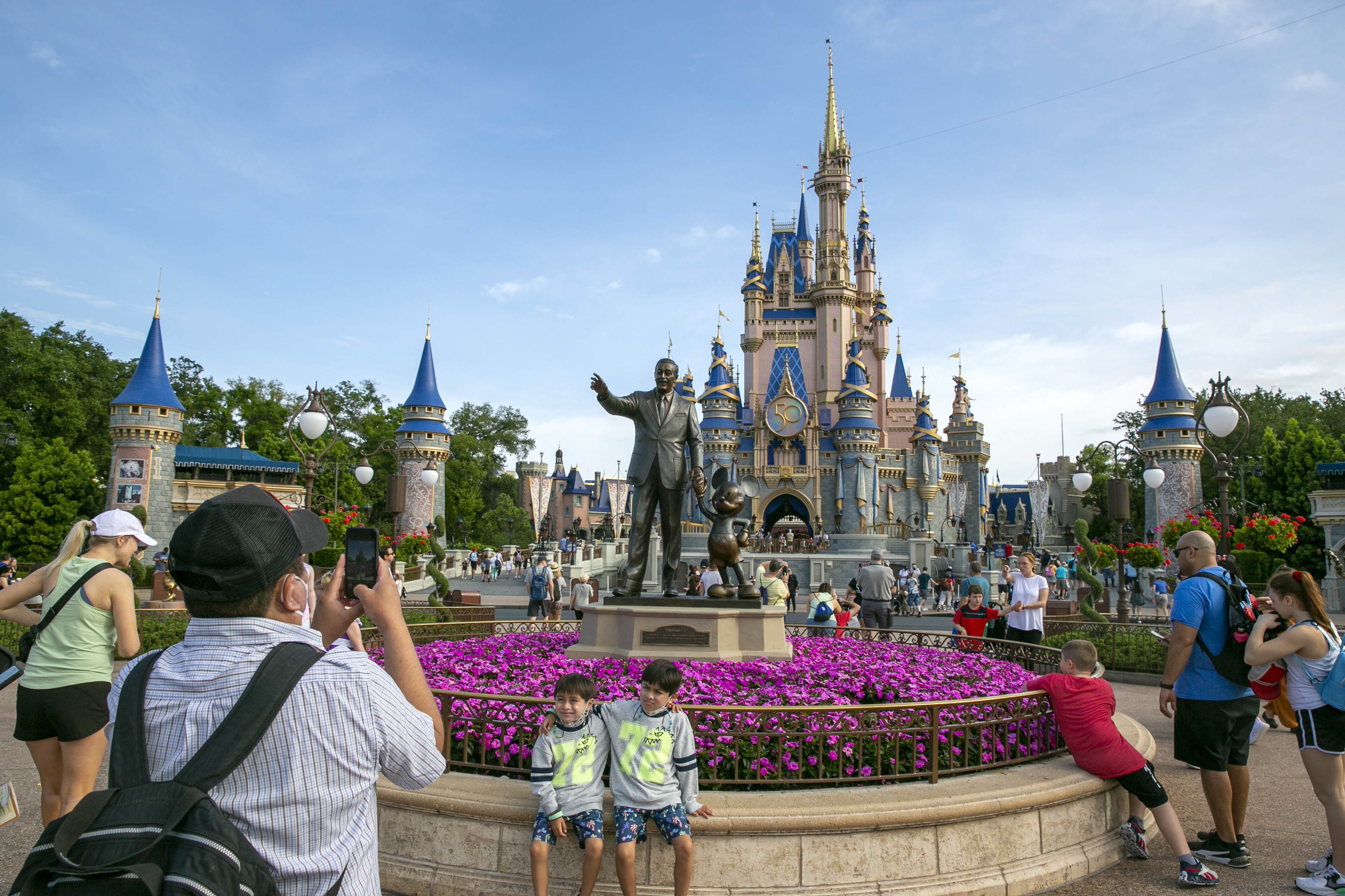 People visit the Magic Kingdom Park at Walt Disney World Resort in Lake Buena Vista, Florida.