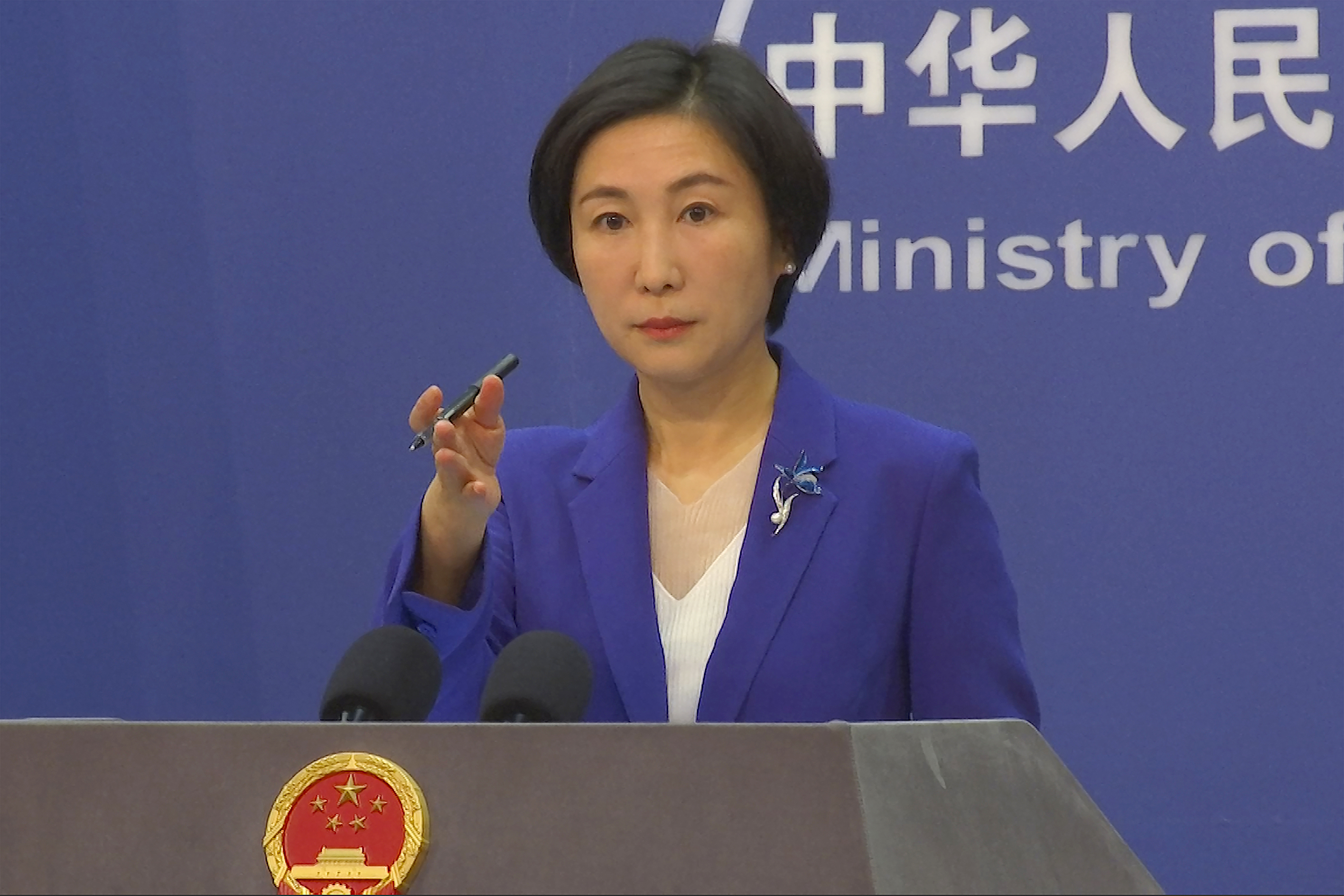 Chinese Foreign Ministry spokesperson Mao Ning gestures during a press conference at the Ministry of Foreign Affairs in Beijing, on Oct 13, 2022.