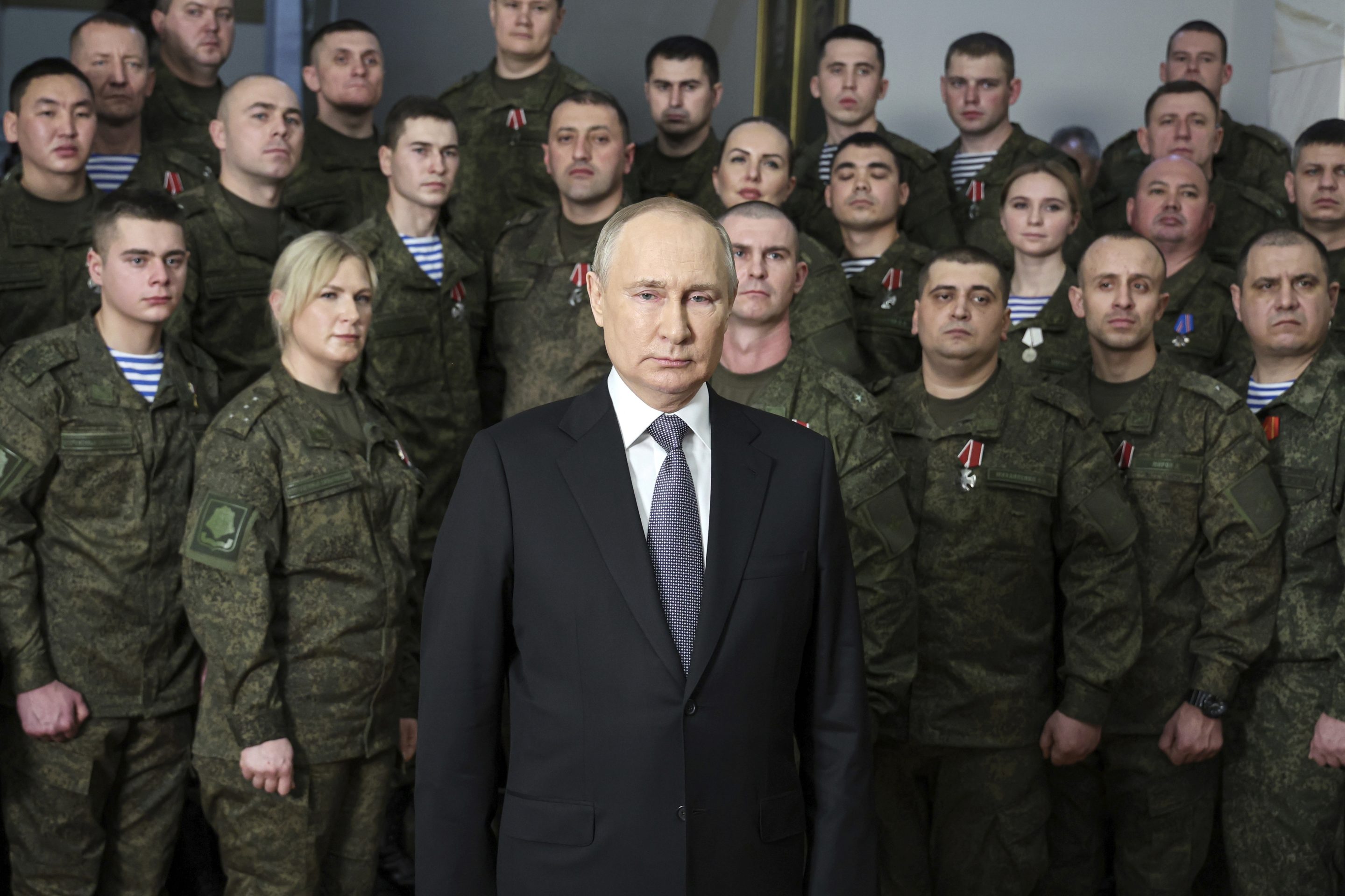 President Vladimir Putin speaks in his annual televised New Year's message after a ceremony during a visit to the headquarters of the Southern Military District, at an unknown location in Russia, Dec. 31, 2022.