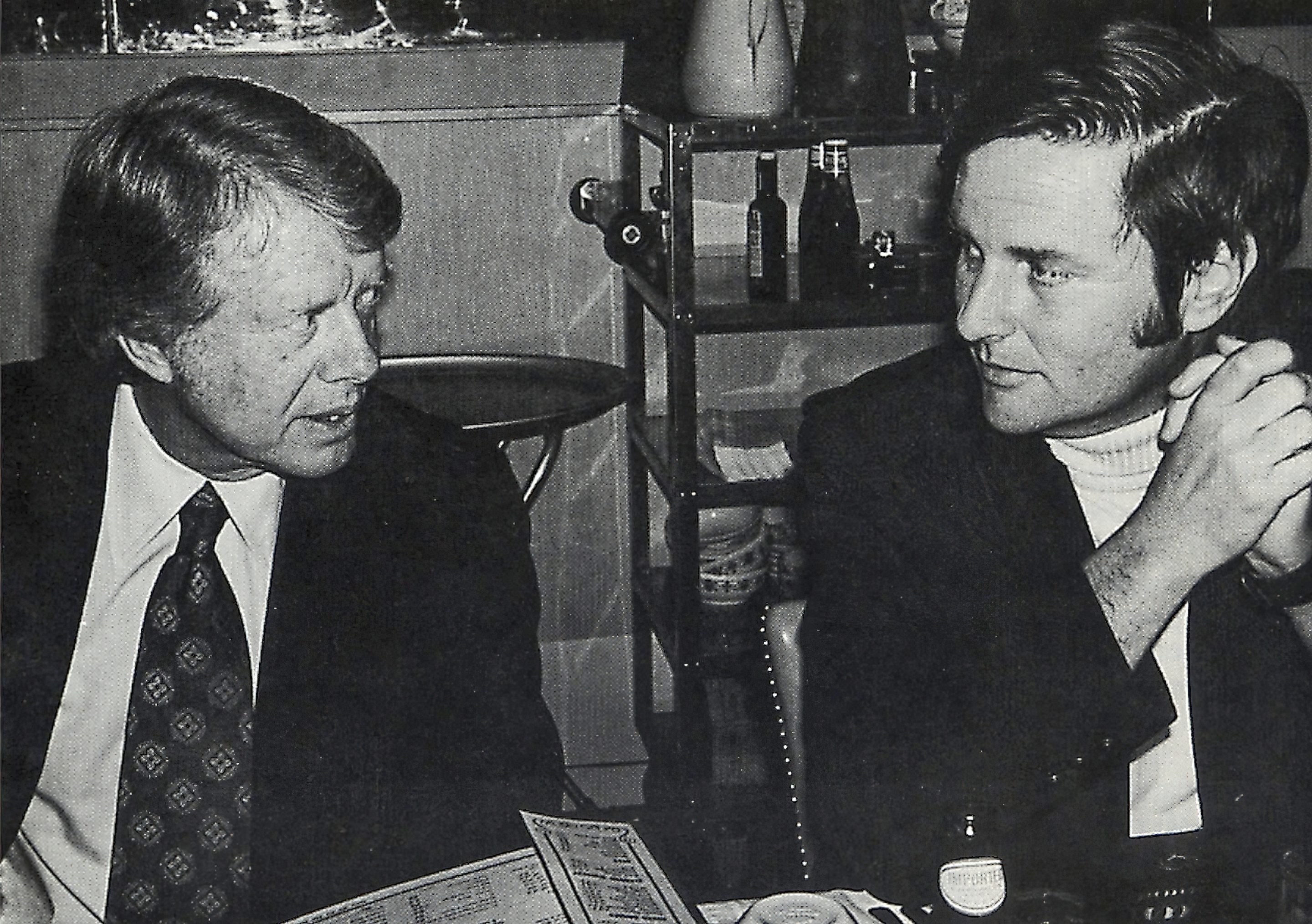 Associated Press Special Correspondent Walter R. Mears, right, talks with presidential candidate Jimmy Carter in Concord, N.H., before the New Hampshire primary election in 1976.