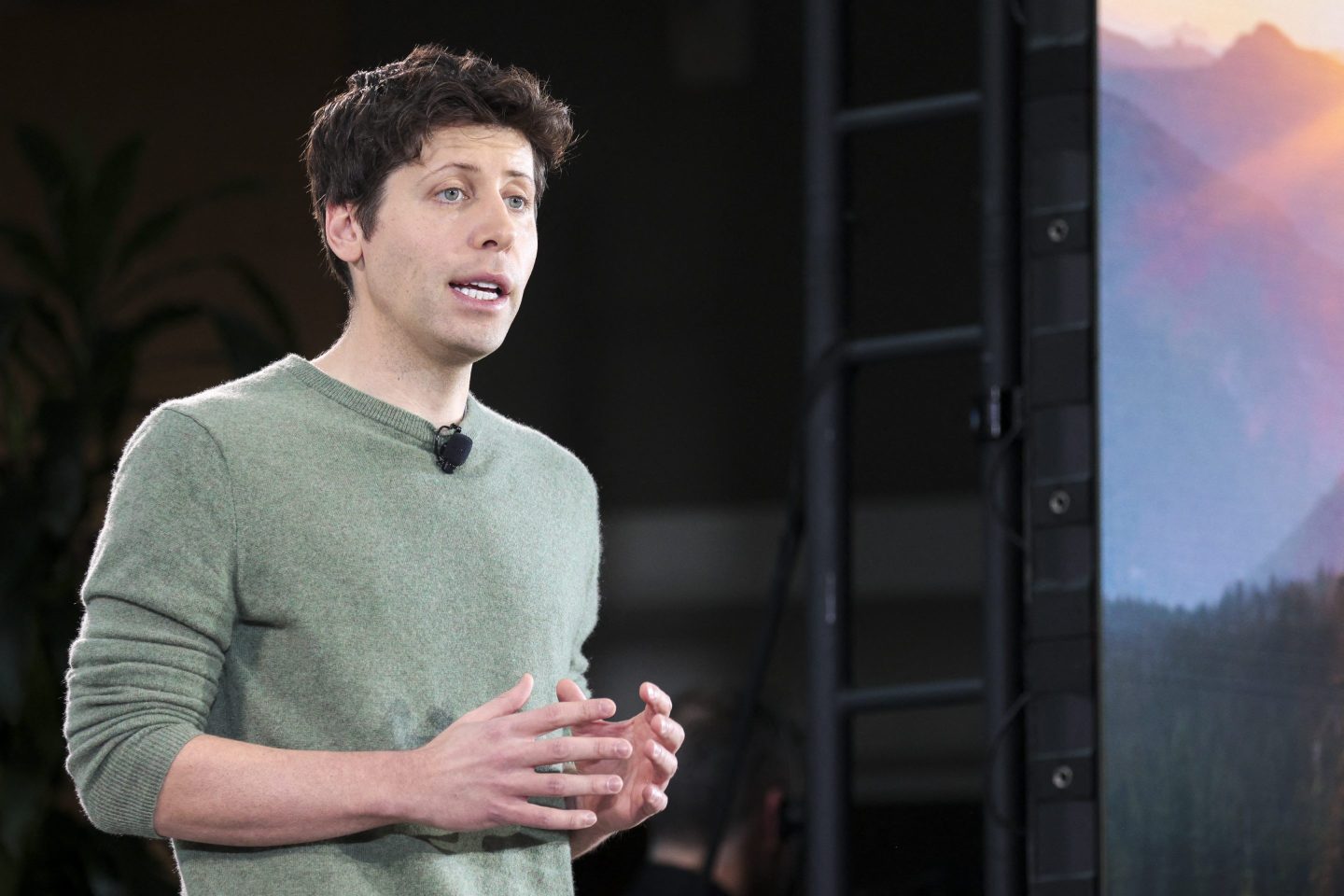 OpenAI CEO Sam Altman speaks at a tech event