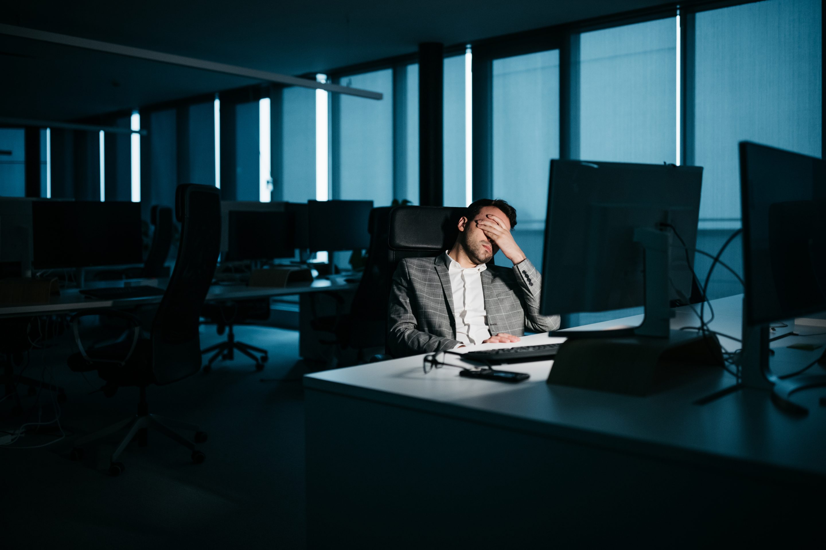 Businessman stressed at night