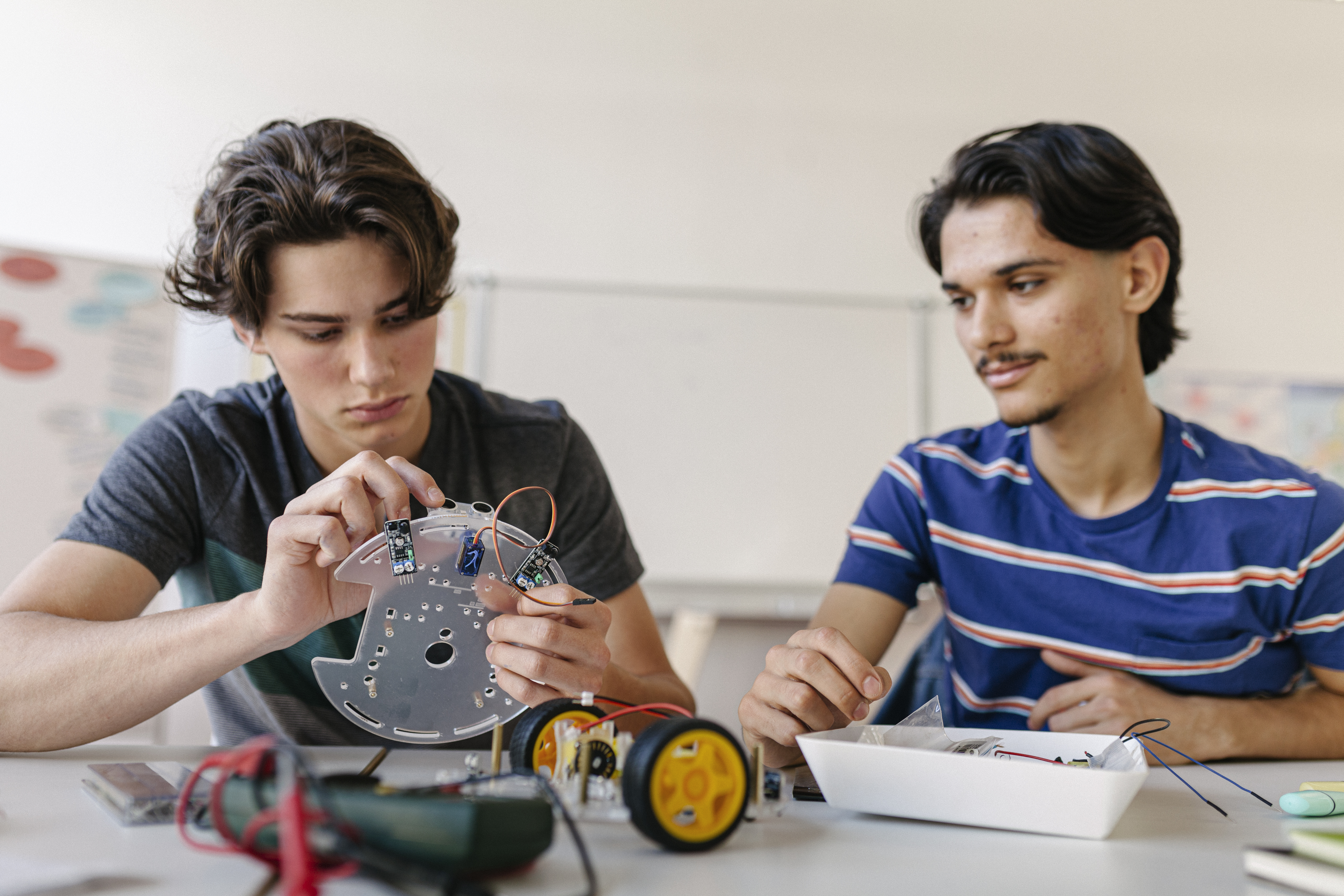 Two students working on a project.