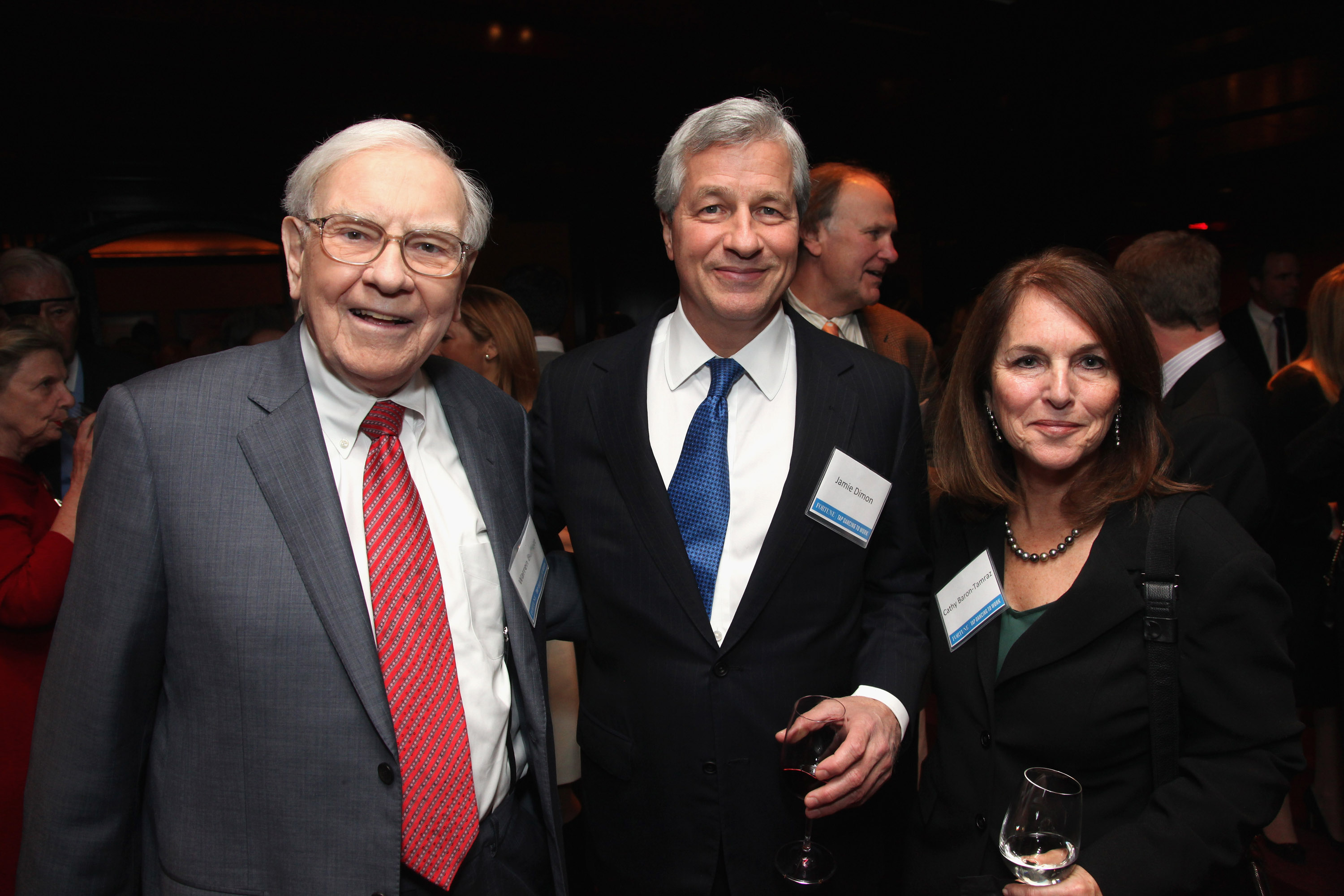 Warren Buffett, Jamie Dimon and Cathy Baron-Tamraz attend A Book Party For Tap Dancing To Work: Warren Buffett On Practically Everything, 1966-2012 By Carol Loomis at The Lambs Club on November 26, 2012 in New York City.