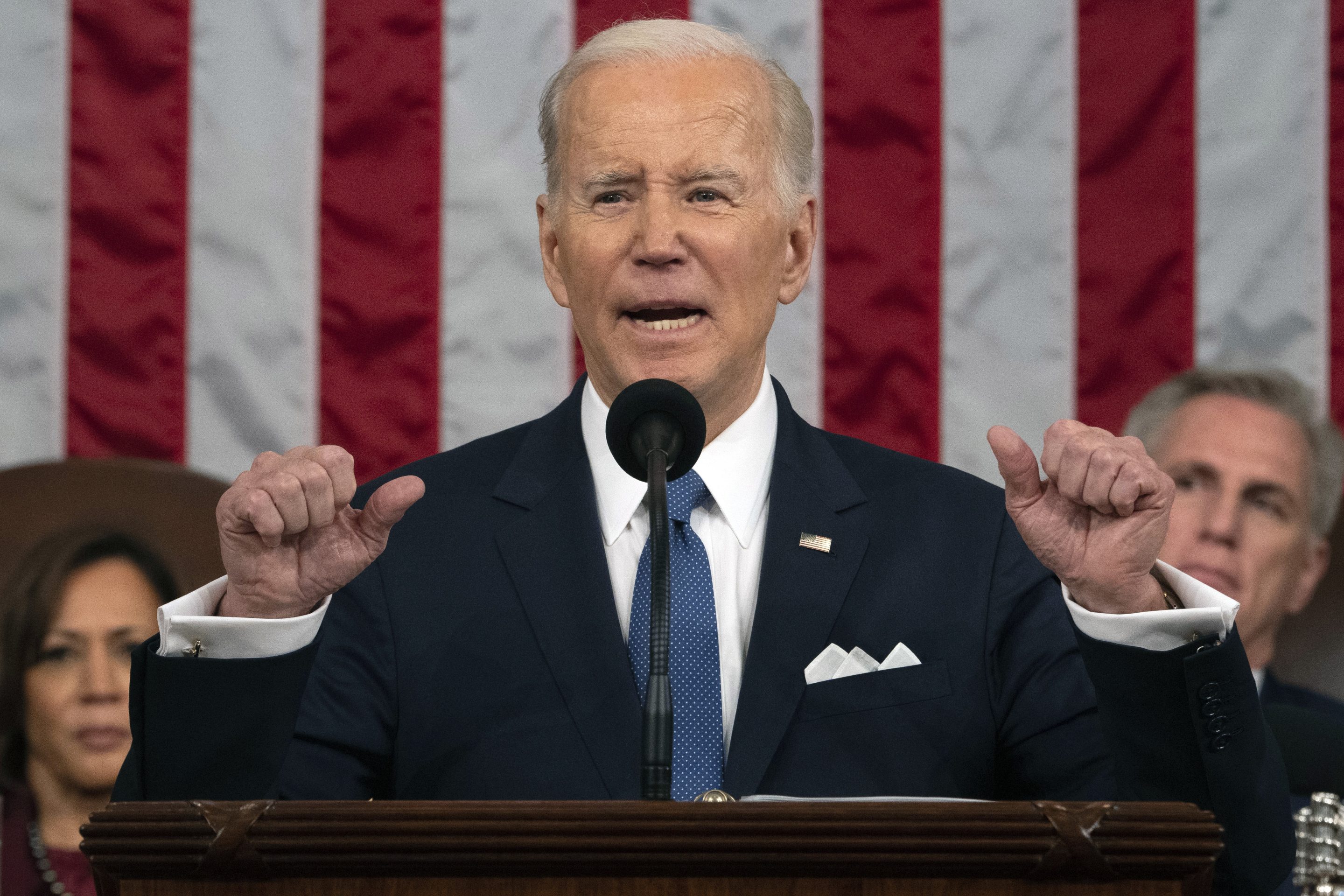 President Joe Biden delivers the State of the Union address to a joint session of Congress at the U.S. Capitol, Feb. 7, 2023, in Washington, as Vice President Kamala Harris and House Speaker Kevin McCarthy of Calif., listen.