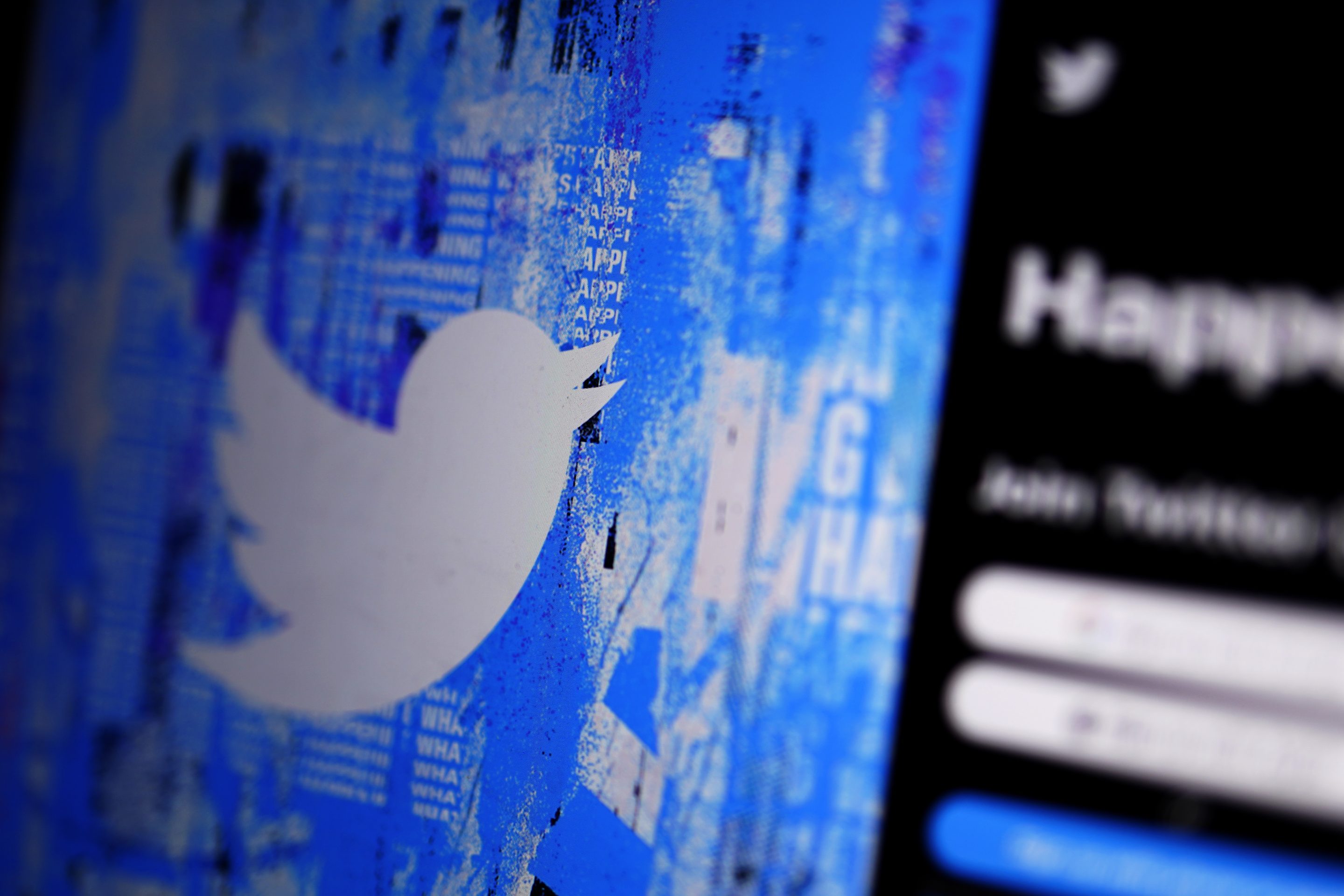 The Twitter splash page is seen on a digital device on April 25, 2022, in San Diego.