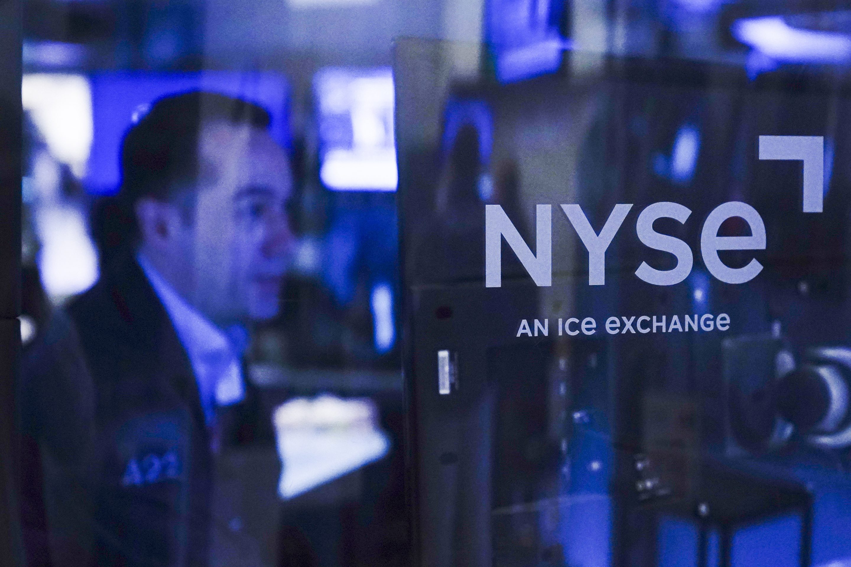 Traders work on the floor at the New York Stock Exchange in New York, Tuesday, Oct. 4, 2022.