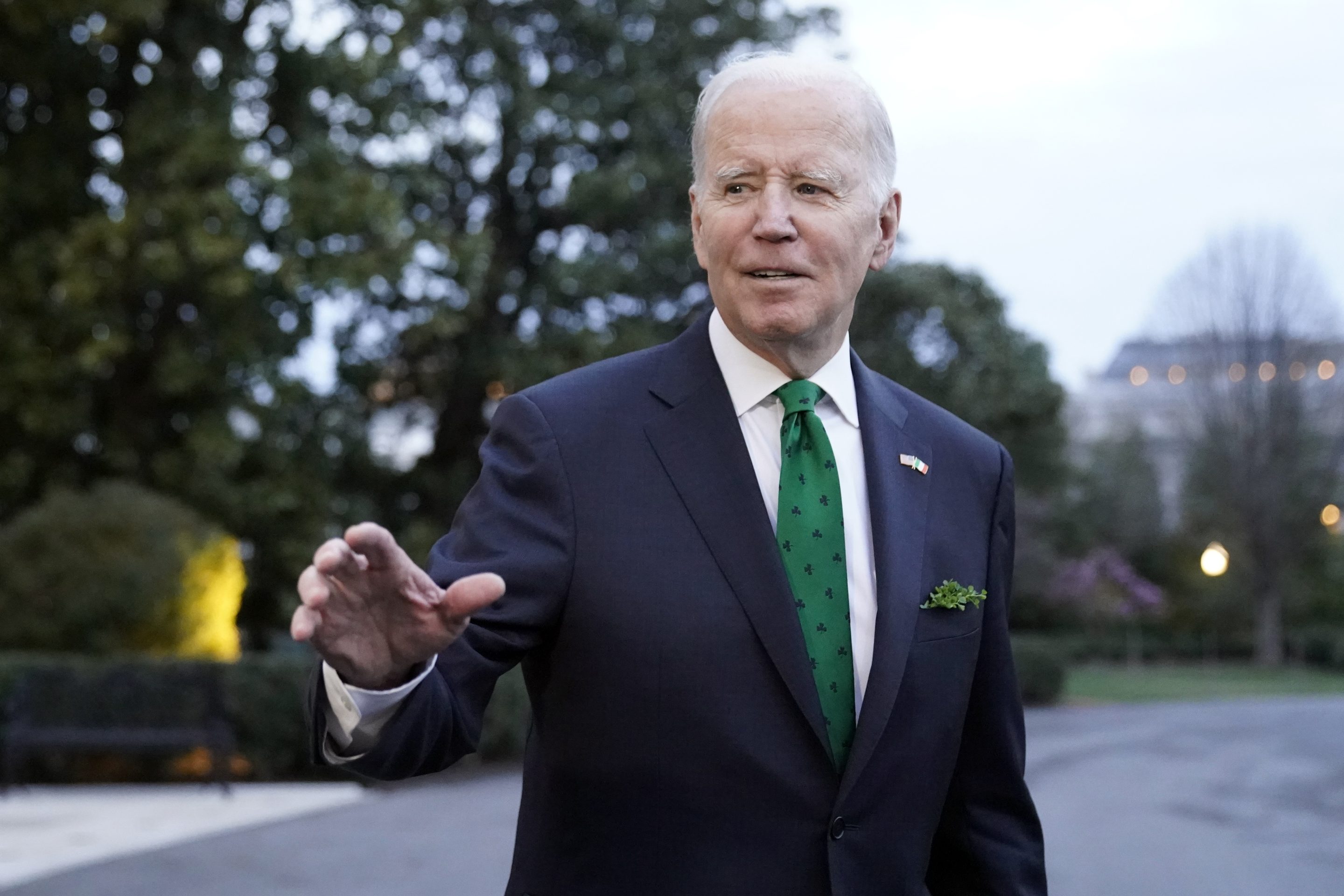 President Joe Biden waves as he walks to Marine One upon departure from the South Lawn of the White House, Friday, March 17, 2023, in Washington.