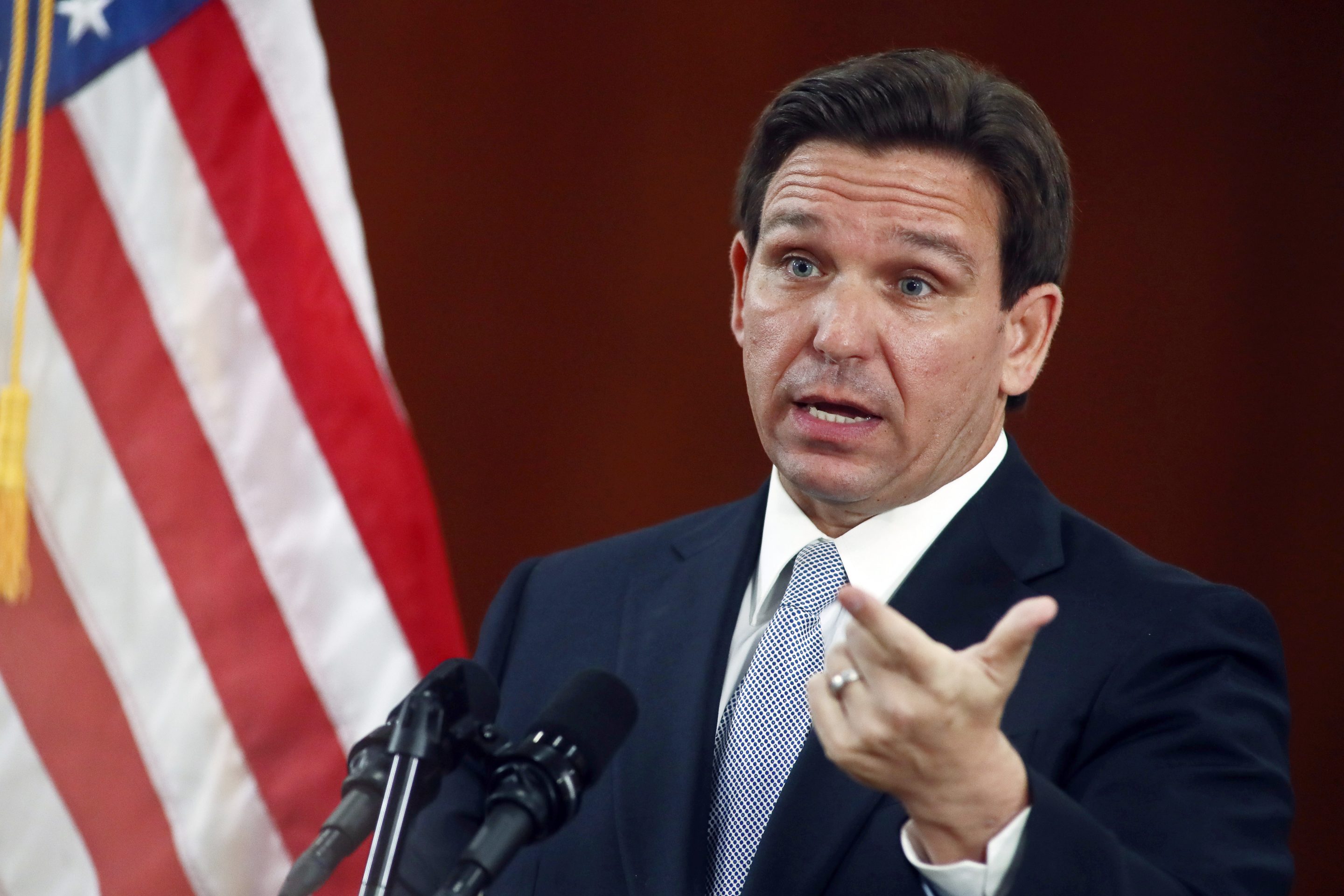 Florida Gov. Ron DeSantis answers questions from the media in the Florida Cabinet following his State of the State address during a joint session of the Senate and House of Representatives, Tuesday, March 7, 2023, at the state Capitol in Tallahassee, Fla.
