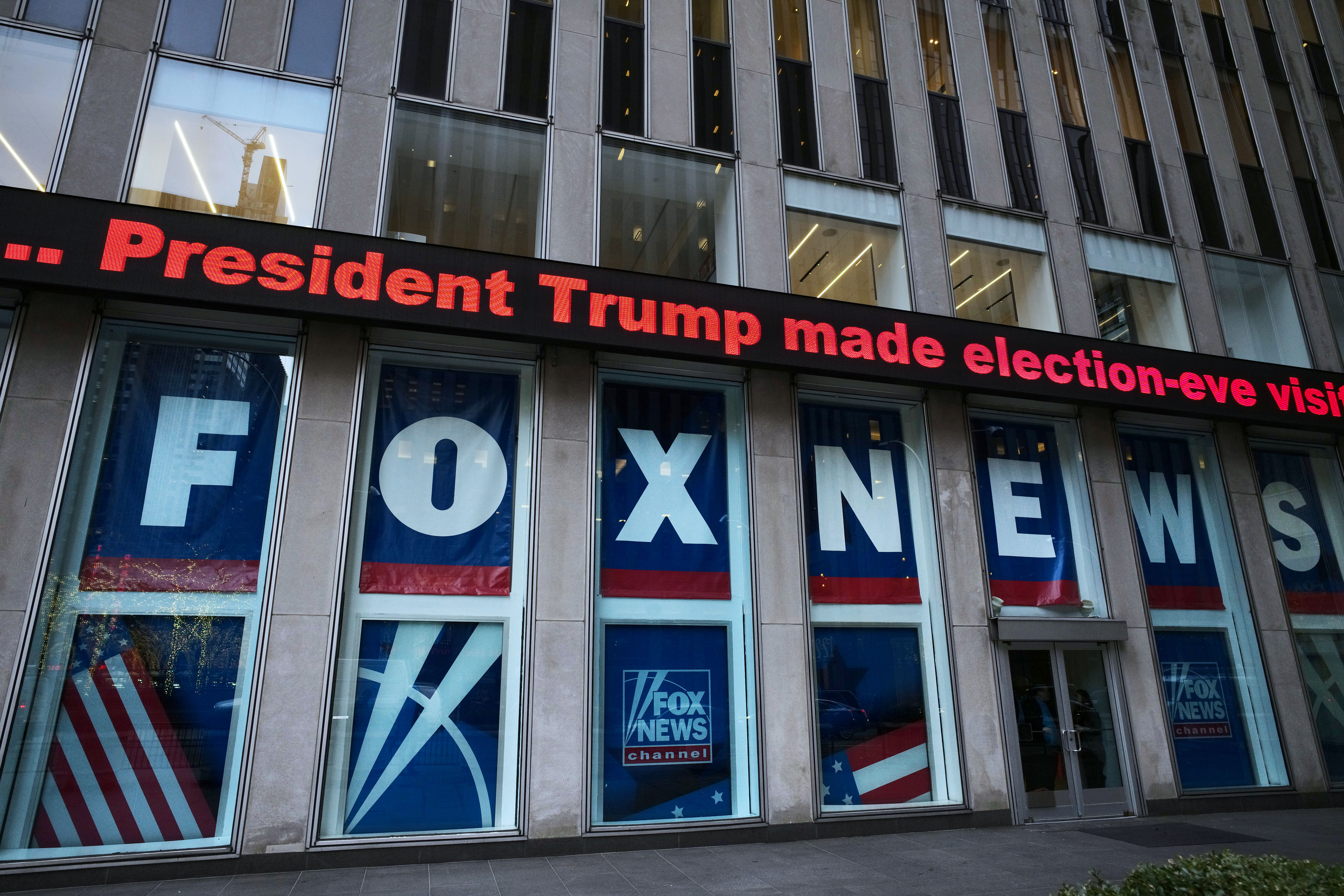 A headline about President Donald Trump is displayed outside Fox News studios in New York on Nov. 28, 2018.