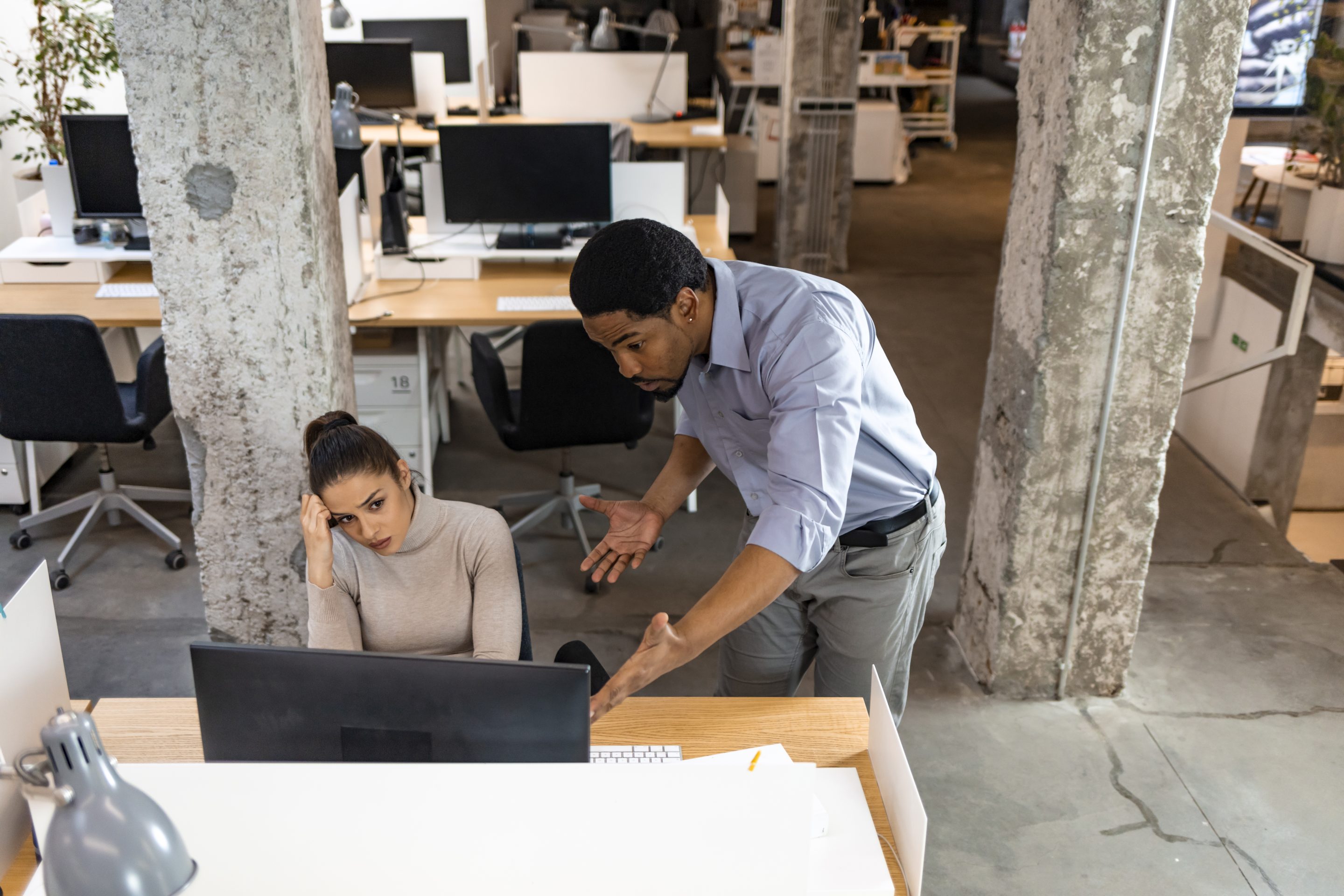 Boss shouting at worker