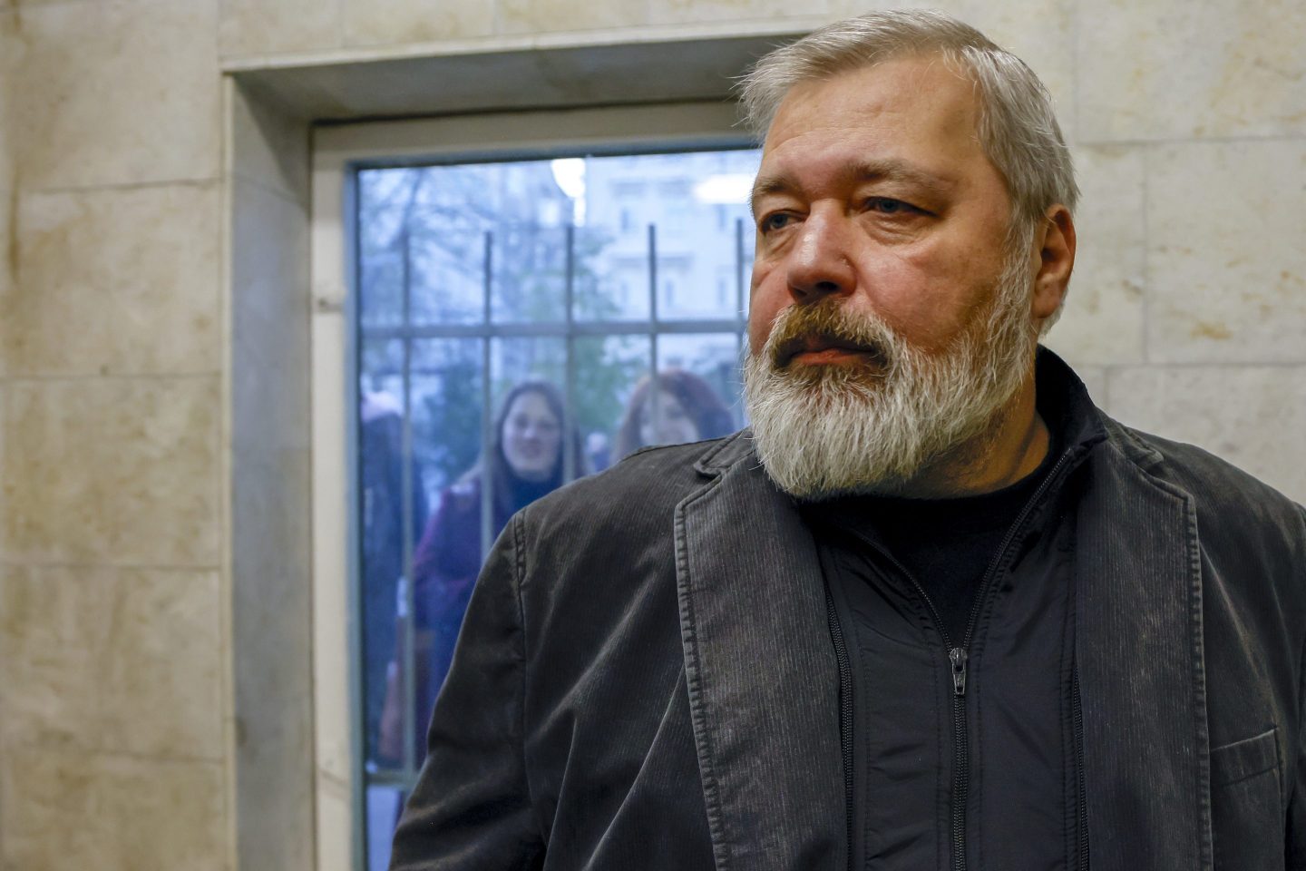 Novaya Gazeta newspaper editor-in-chief Dmitry Muratov talks to the media in front of the Novaya Gazeta building in Moscow, Russia after winning the Nobel Peace Prize on October 08, 2021.