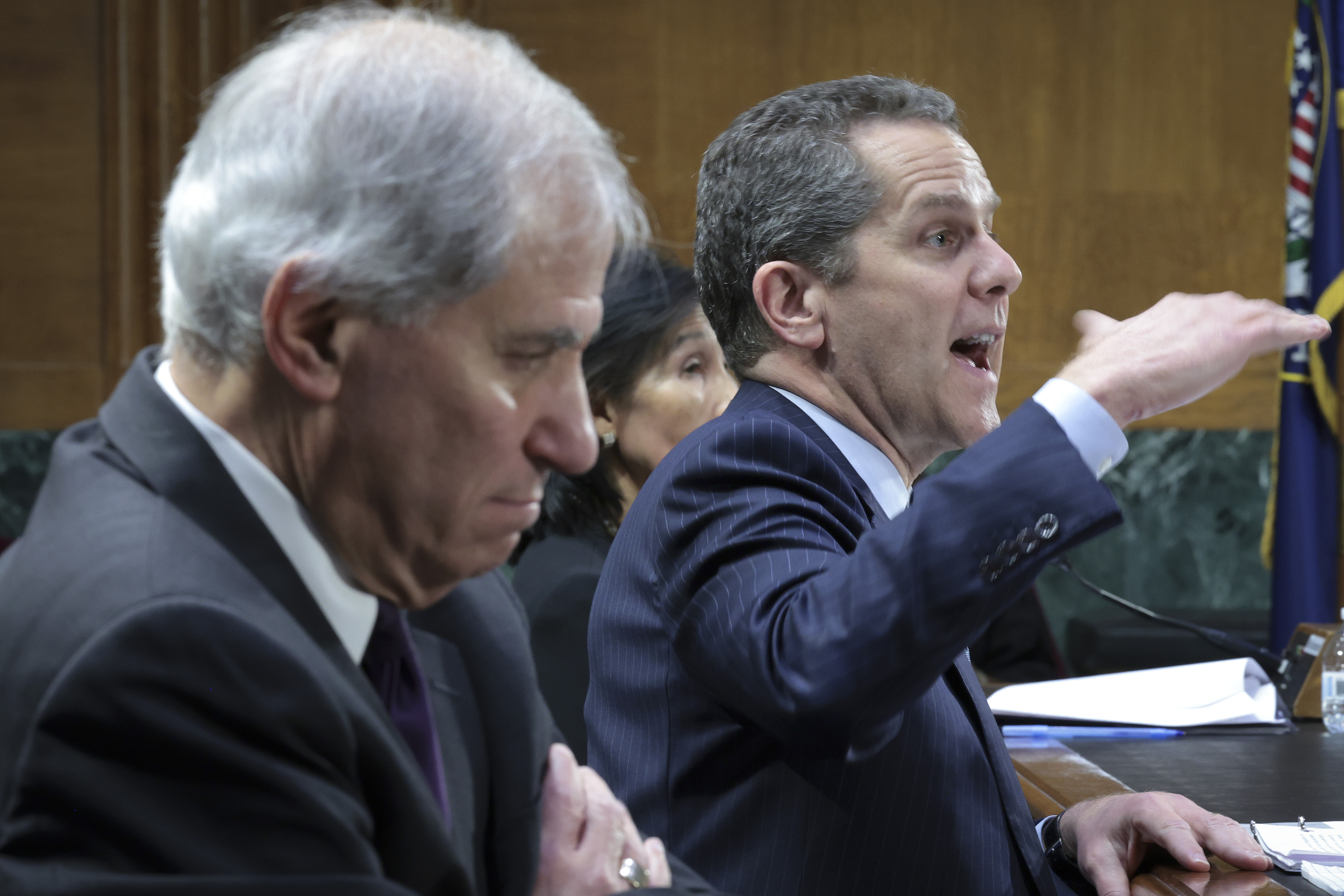 Federal Reserve Board Vice Chair for Supervision Michael S. Barr (R) testifies before the Senate Banking, Housing and Urban Affairs Committee March 28, 2023 in Washington, DC. The committee heard testimony on the topic of "Recent Bank Failures and the Federal Regulatory Response." Also pictured is Federal Deposit Insurance Corporation Chairman Martin Gruenberg. 
