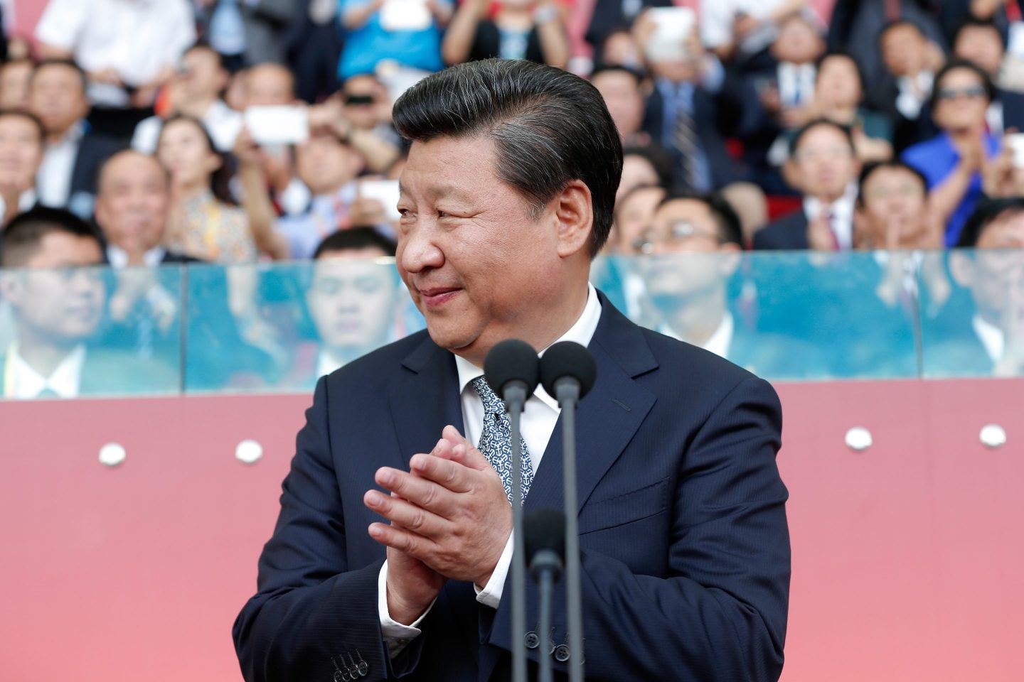 A picture of Xi Jinping clapping