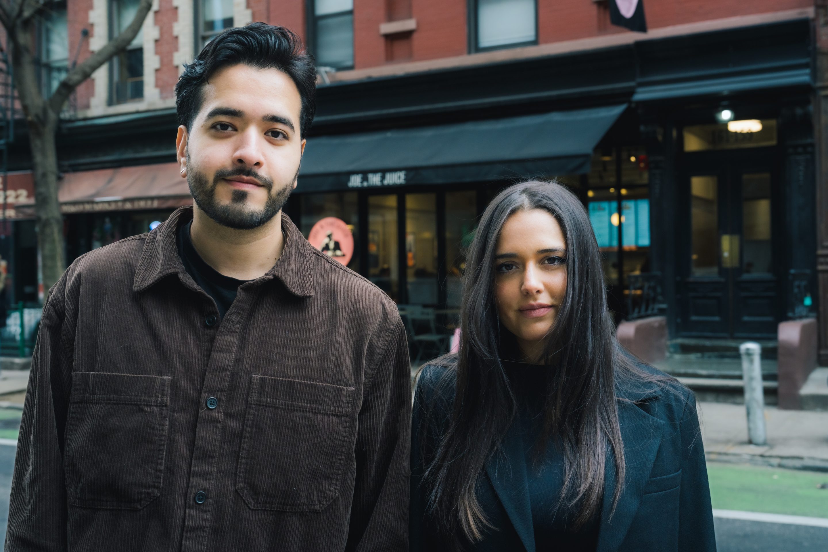 Joe & The Juice regional managers Muhammad Haq (left) and Valerie Simmonds (right) in front of a juice bar location in New York City.