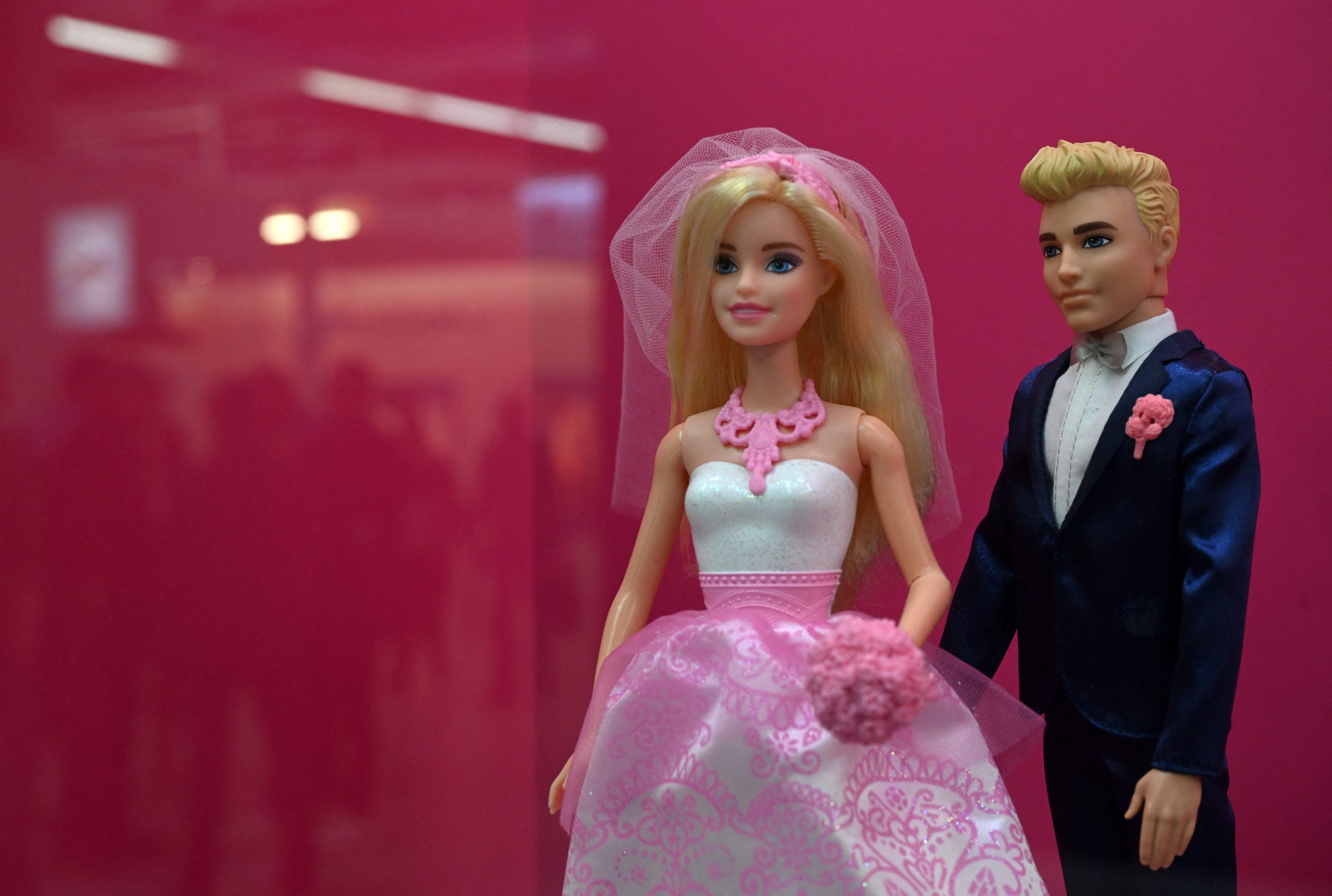 Barbie and Ken dolls.