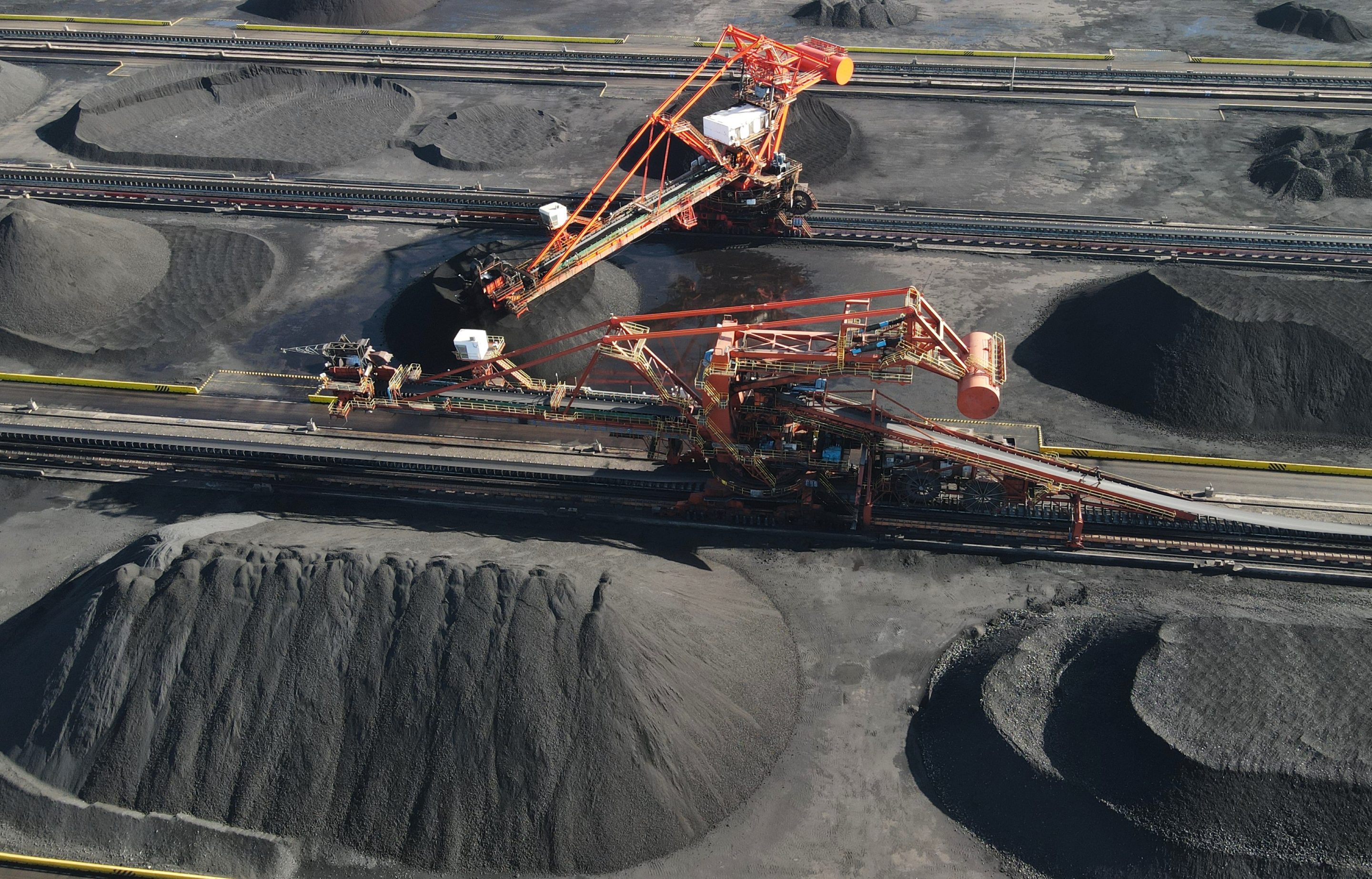 Conveyor belts transporting coal into piles at Huanghua Port in China