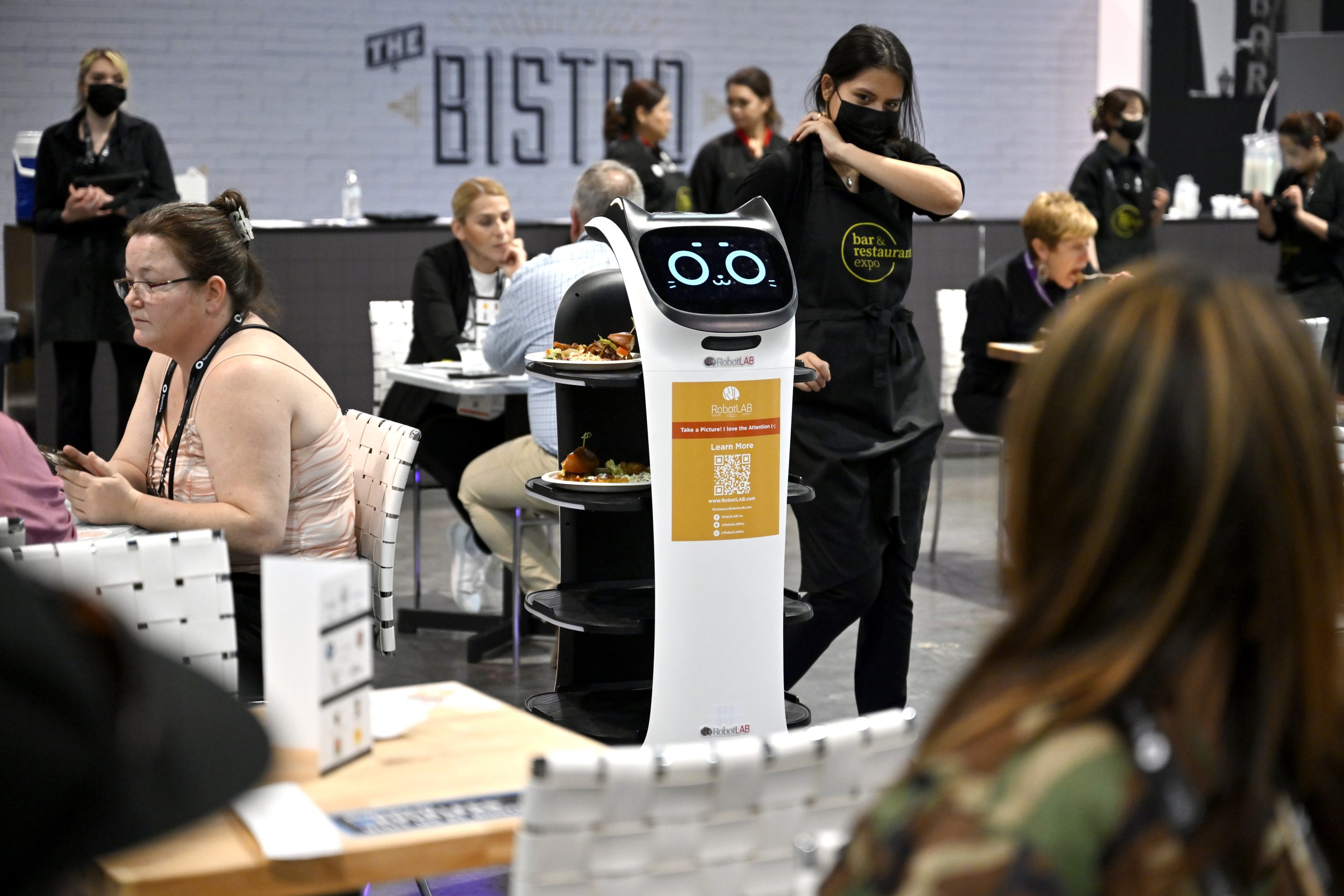 Some restaurants think robot waiters ease workload on staff. Others think they just get in the way.