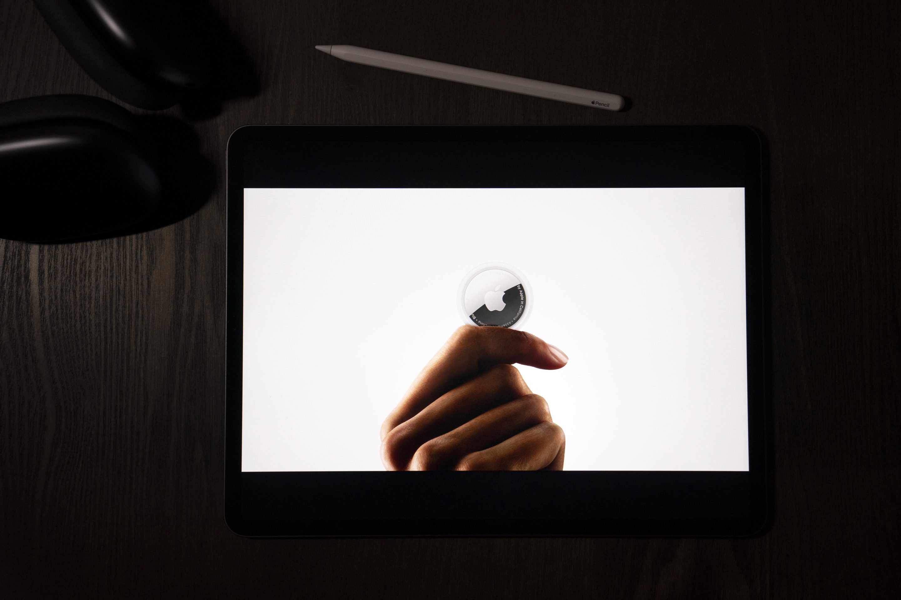 In this illustration photographed in La Habra, Calif., the AirTag tracking device is introduced during a virtual event held to announce new Apple products on April 20, 2021.