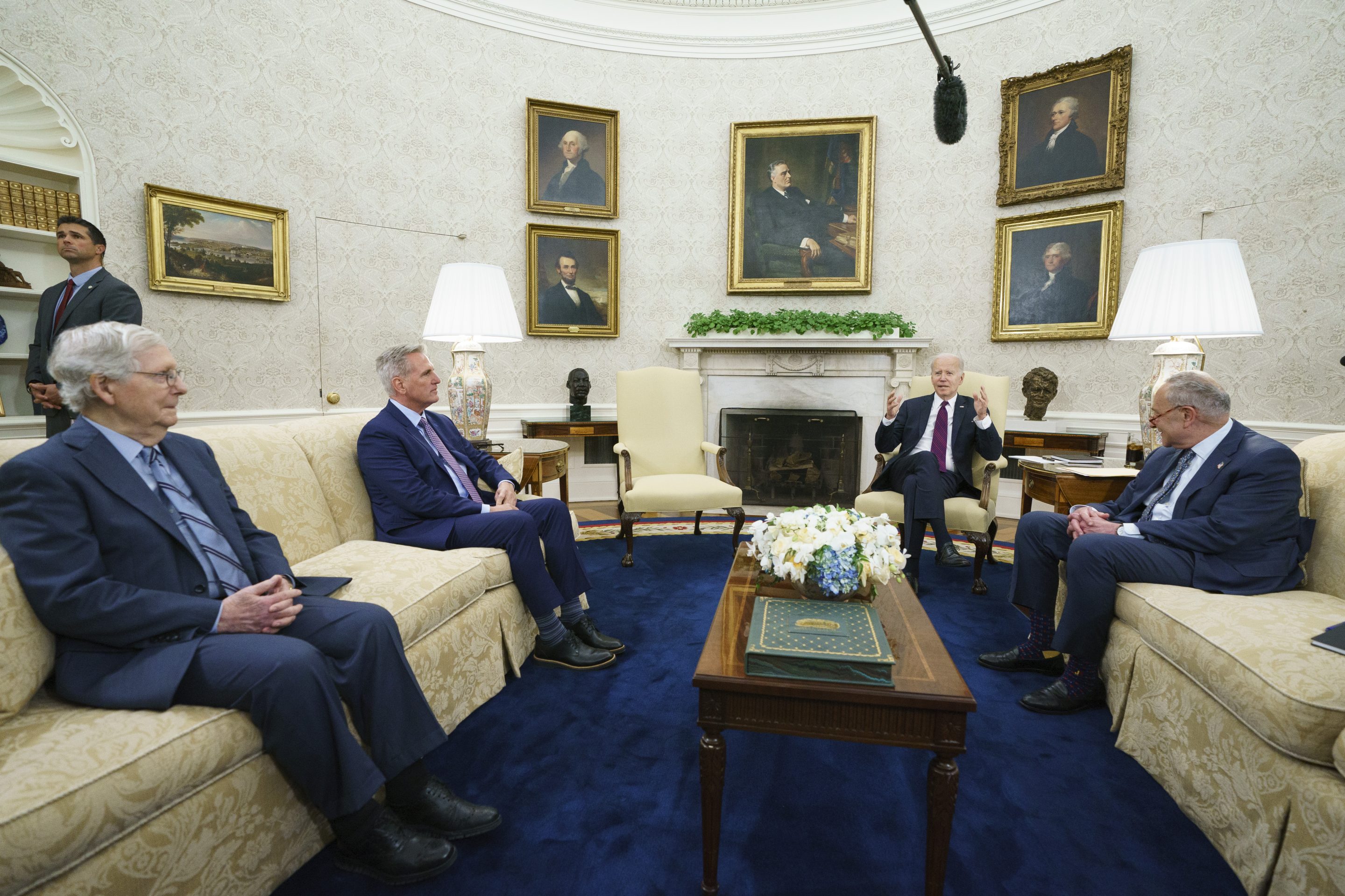 Senate Minority Leader Mitch McConnell of Ky., Speaker of the House Kevin McCarthy of Calif., and Senate Majority Leader Sen. Chuck Schumer of N.Y., listen as President Joe Biden speaks before a meeting to discuss the debt limit in the Oval Office of the White House, on May 9, 2023, in Washington.