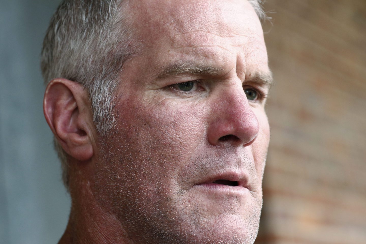 Former NFL quarterback Brett Favre would like to be removed as a defendant in a civil trial over millions of misspent welfare money