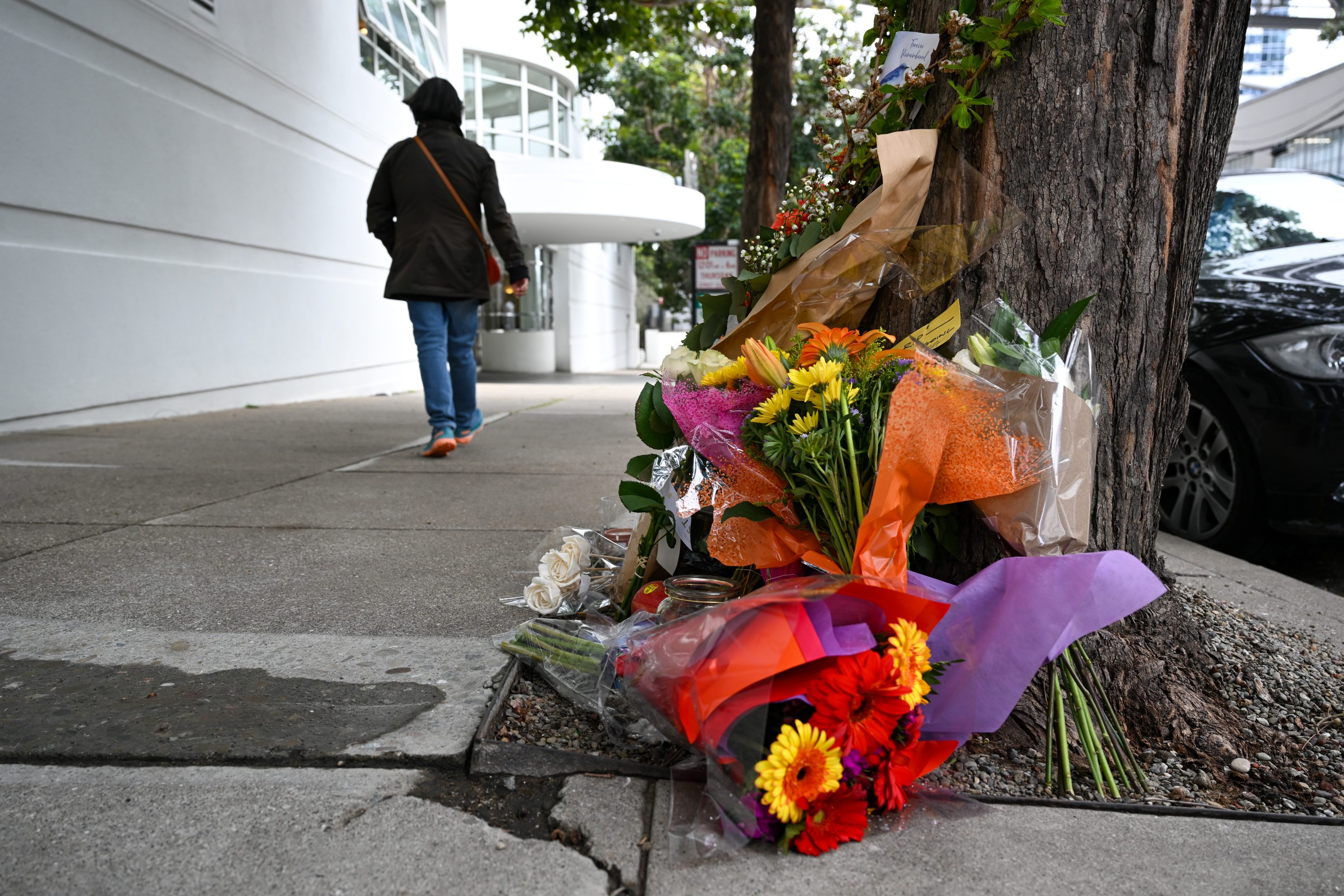 Flowers and cards left as people paying tribute to Bob Lee near where he was killed in San Francisco on April 7, 2023.