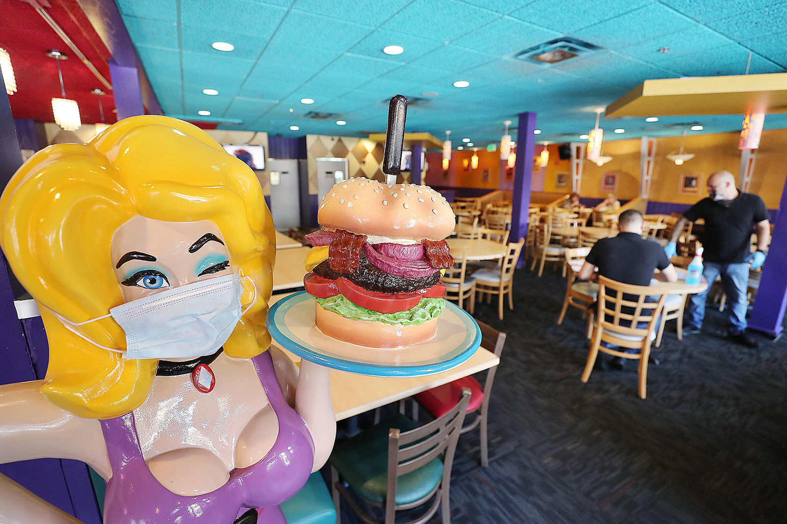 Hamburger Mary's on Church Street in Orlando is suing Gov. Ron DeSantis and the state of Florida claiming the business, which hosts drag shows, will be deprived of its First Amendment rights and is already losing customers under a new law affecting its drag performances. 