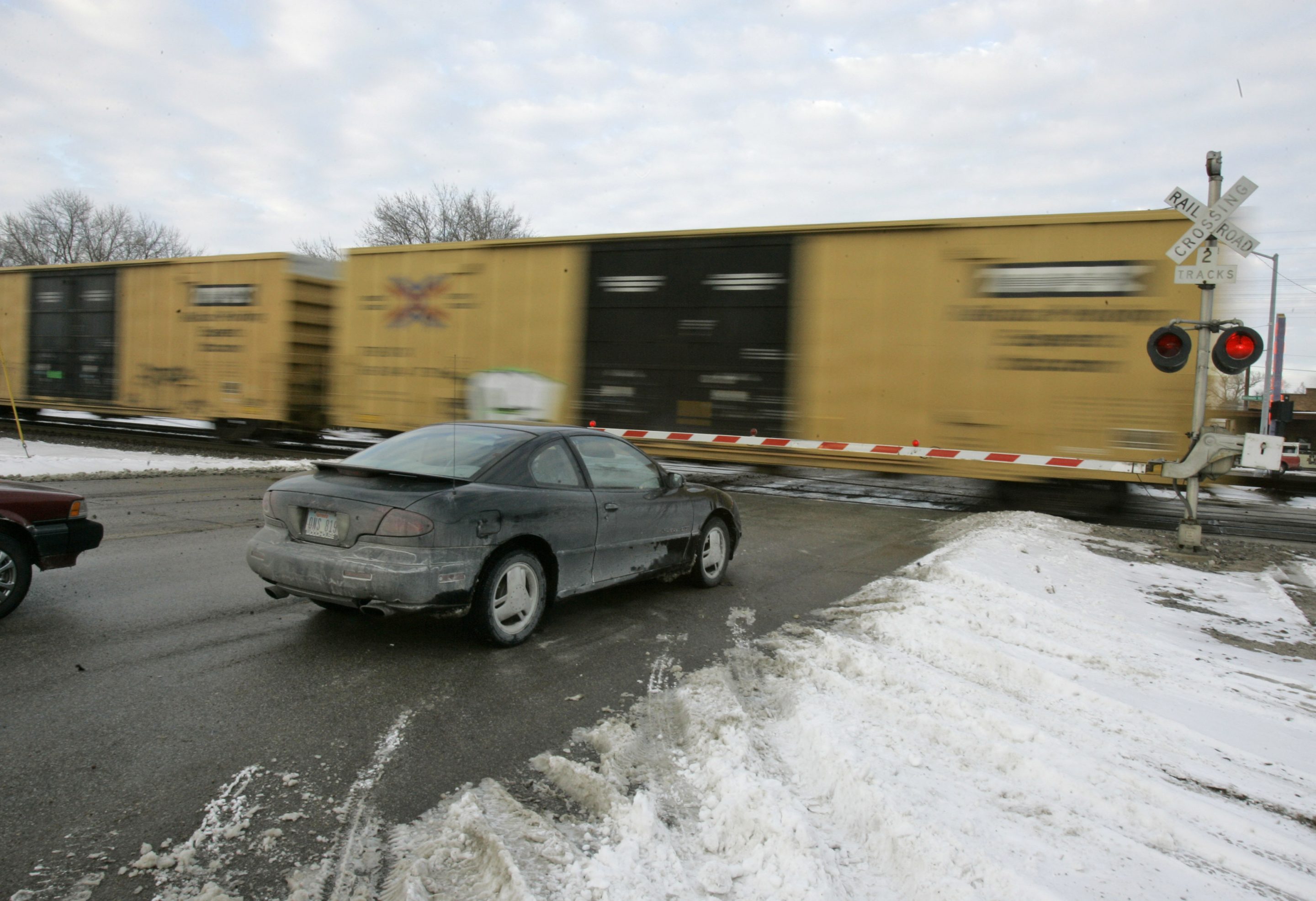 With the rail industry relying on longer and longer trains to cut costs, the Biden administration is handing out $570 million in grants to help eliminate railroad crossings in 32 states.