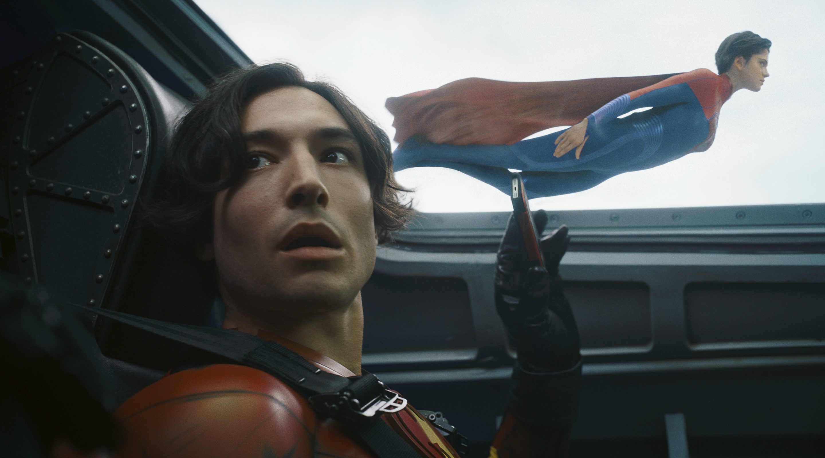 Ezra Miller, left, and Sasha Calle in a scene from "The Flash."