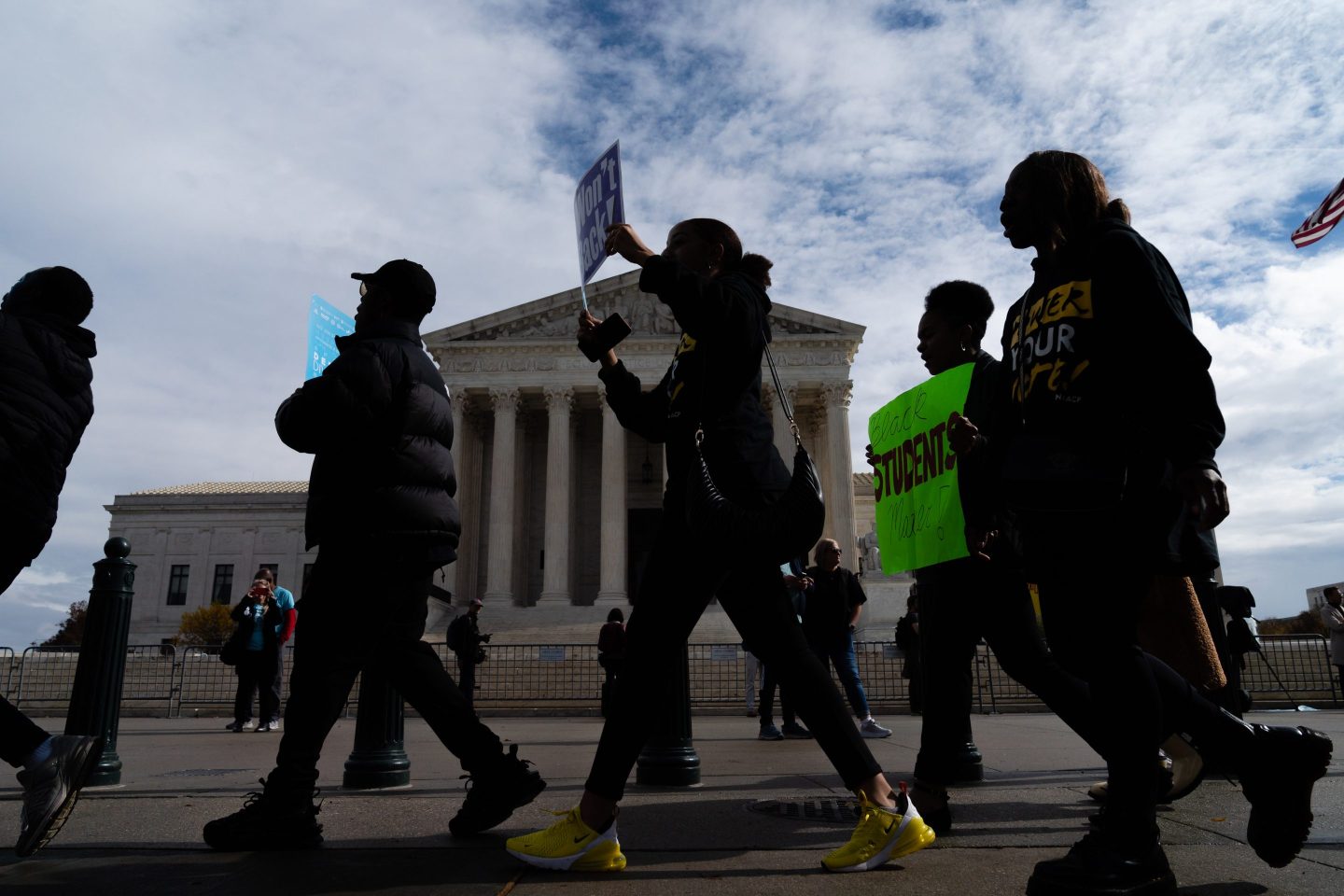 upporters march during a rally in support affirmative action policies outside the Supreme Court in Washington, D.C. on October 31, 2022