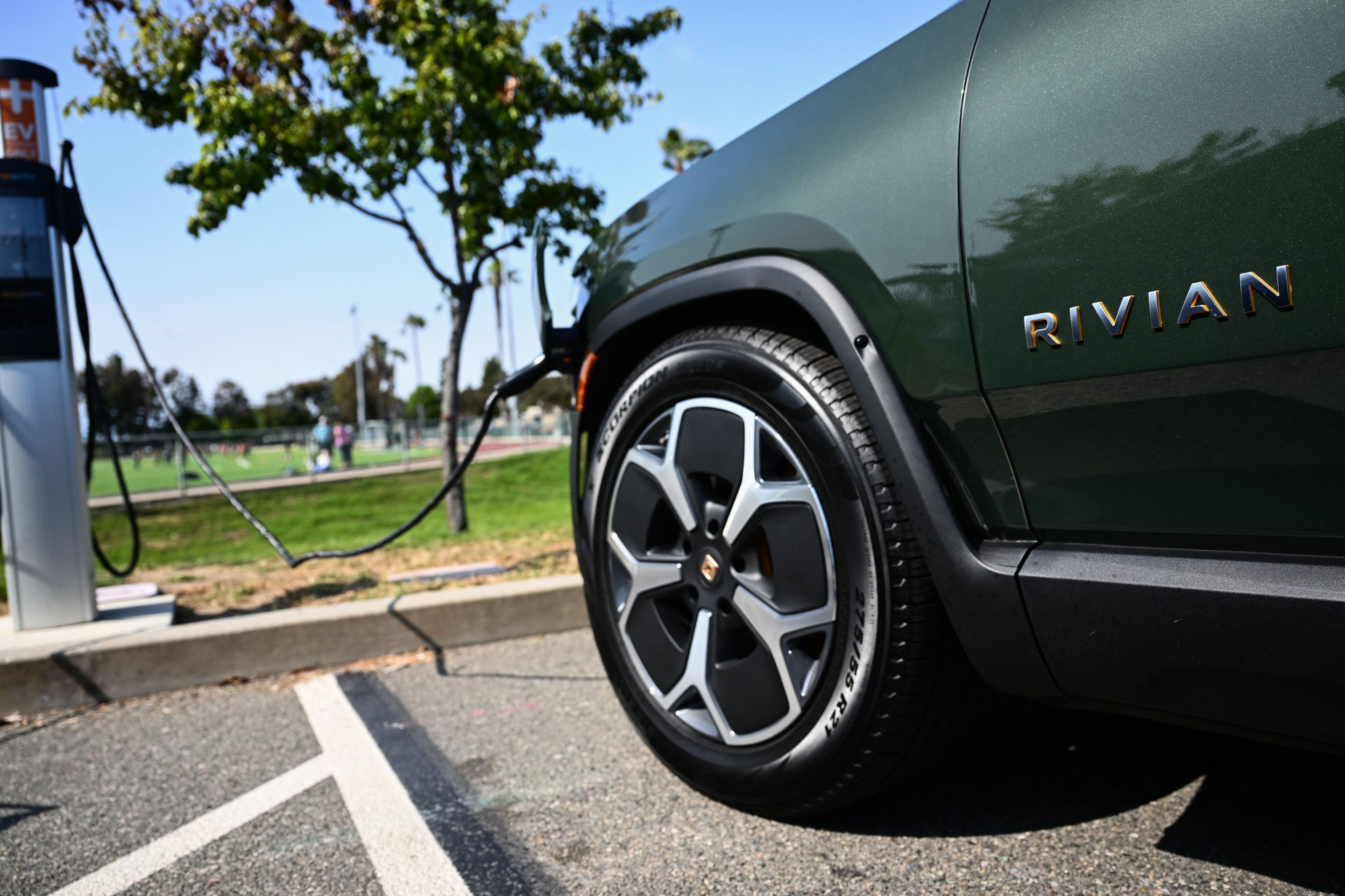 A Rivian R1S electric sports utility vehicle (SUV) charges.