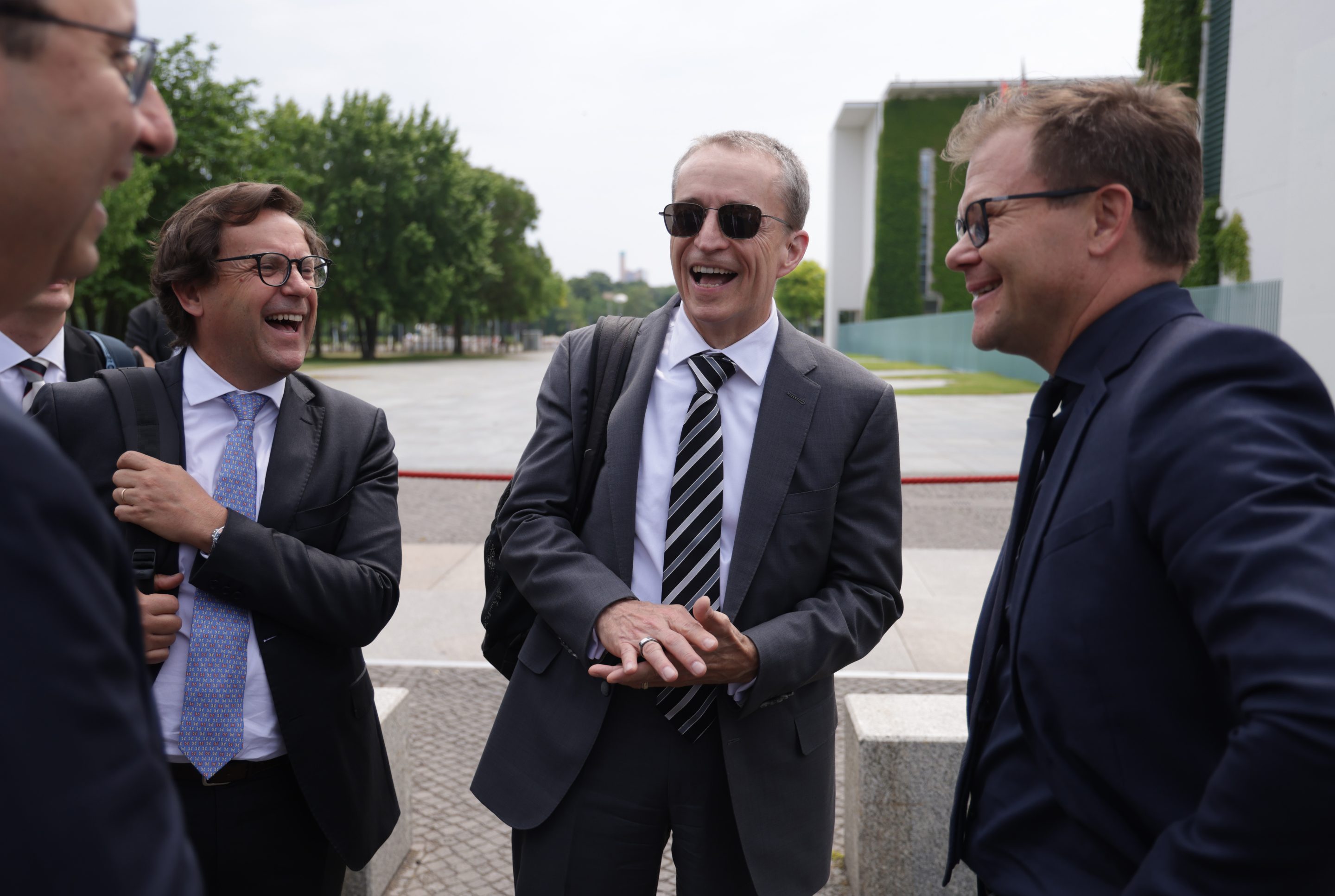 Intel CEO Pat Gelsinger (center) and members of his delegation arrive at the chancellery to sign an agreement with the German government on subsidies for the construction of a new Intel chip factory on June 19, 2023, in Berlin.  
