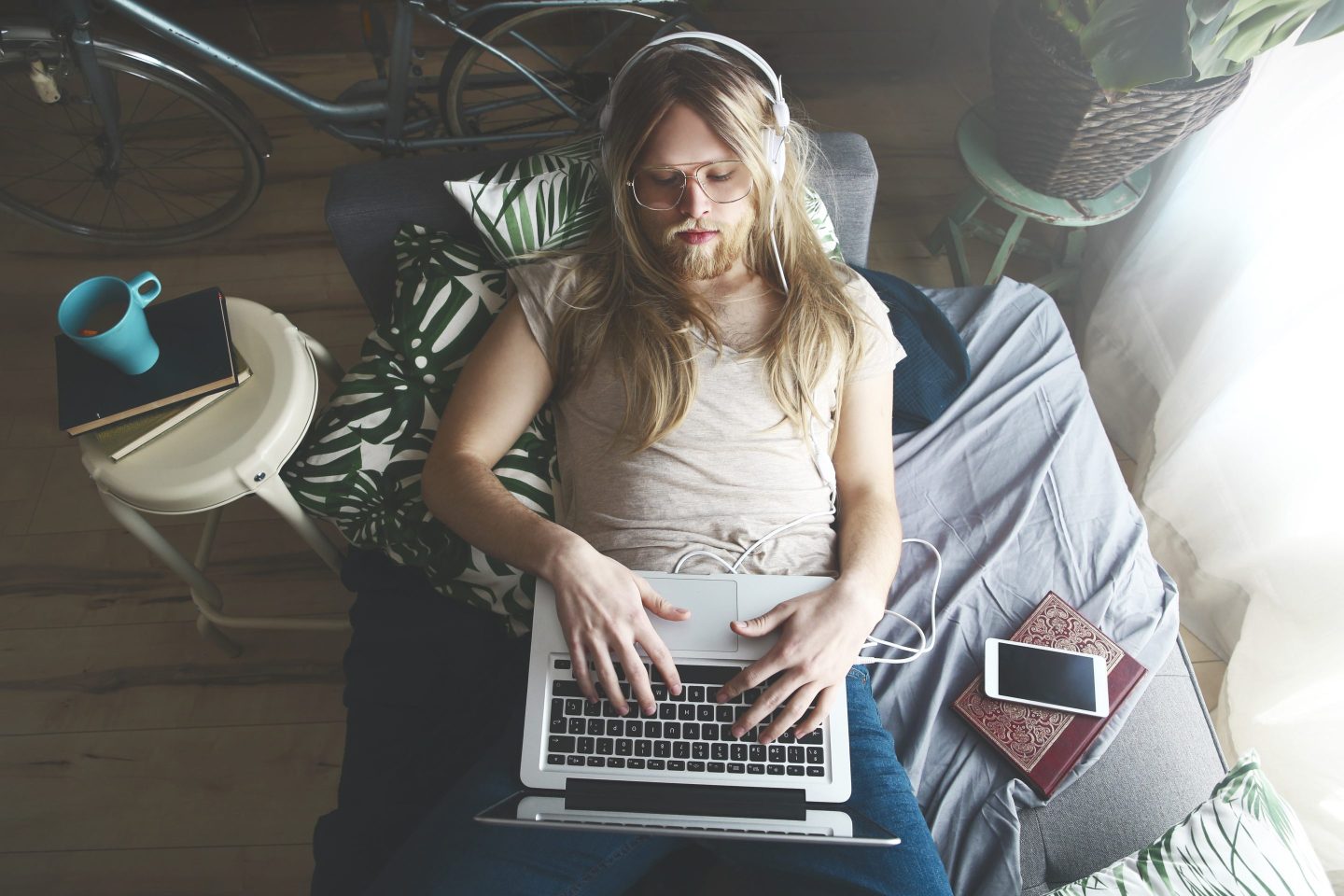Man on couch with laptop