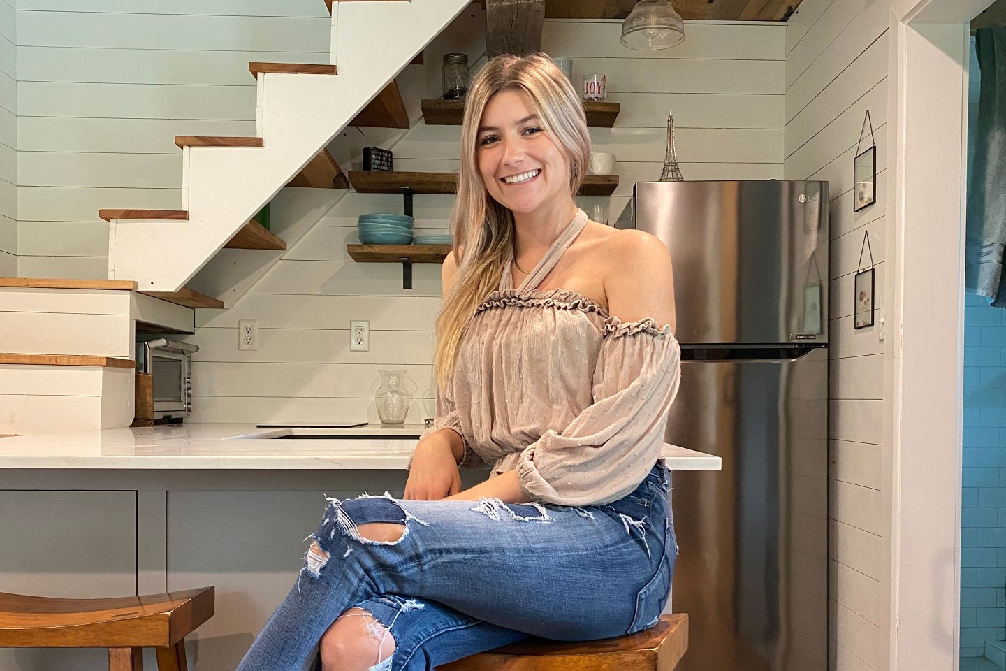 How a 24-year-old saved enough money to buy a $250,000 house by living in a tiny home her parents built for her in their backyard