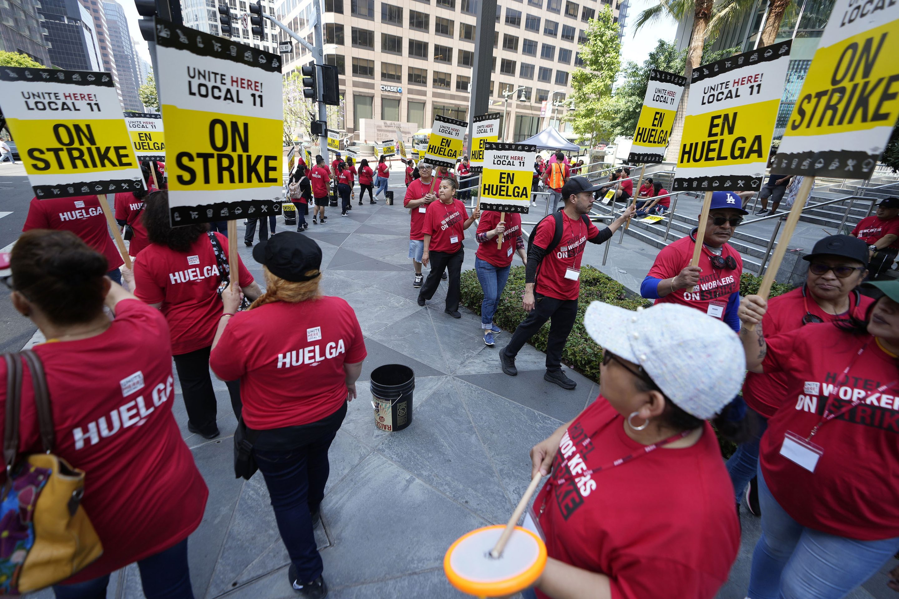 Striking hotel workers rally outside the Intercontinental Hotel after walking off their job on July 2, 2023, in downtown Los Angeles.
