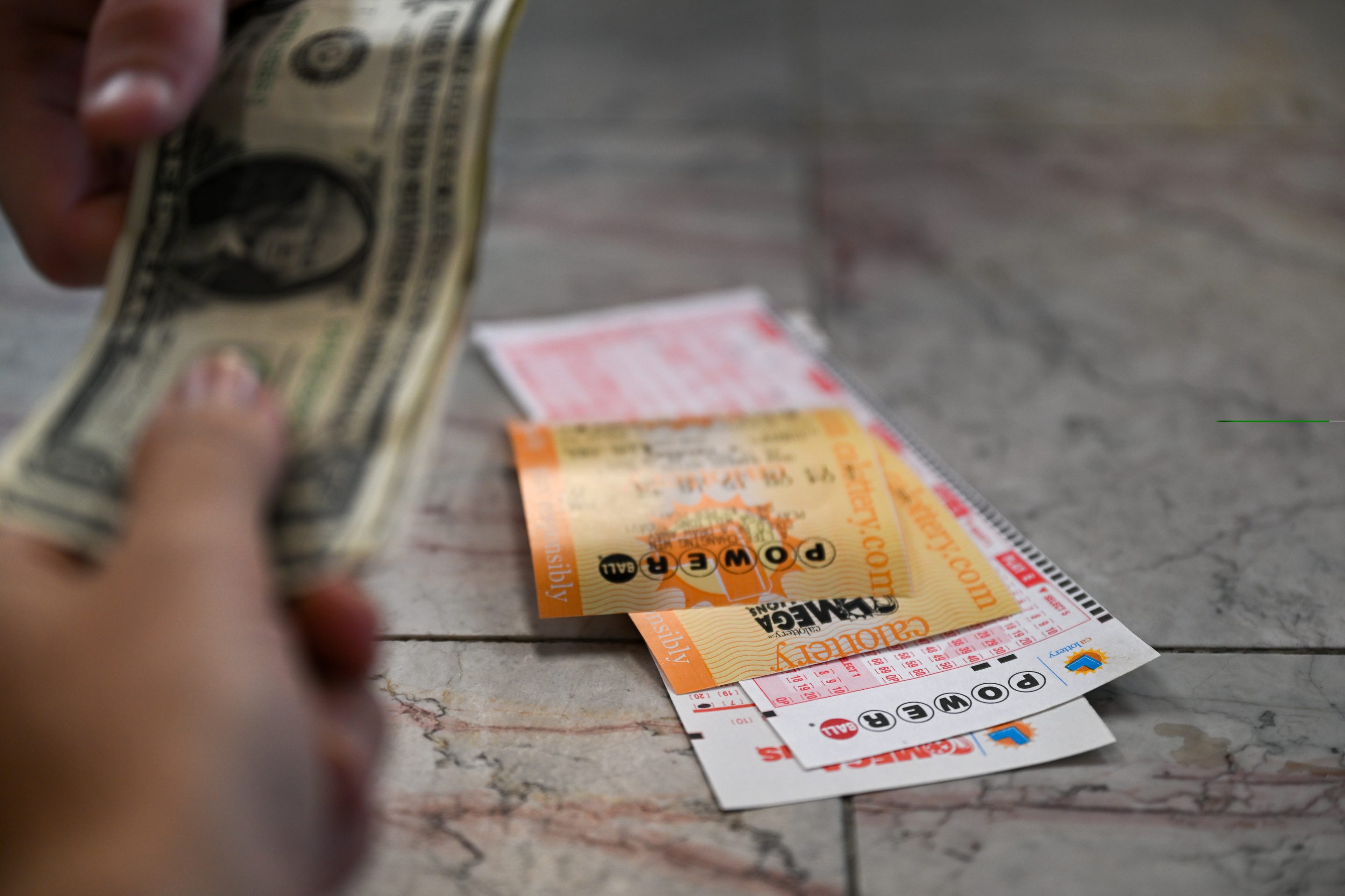 Win the lottery? Don't quit your day job.