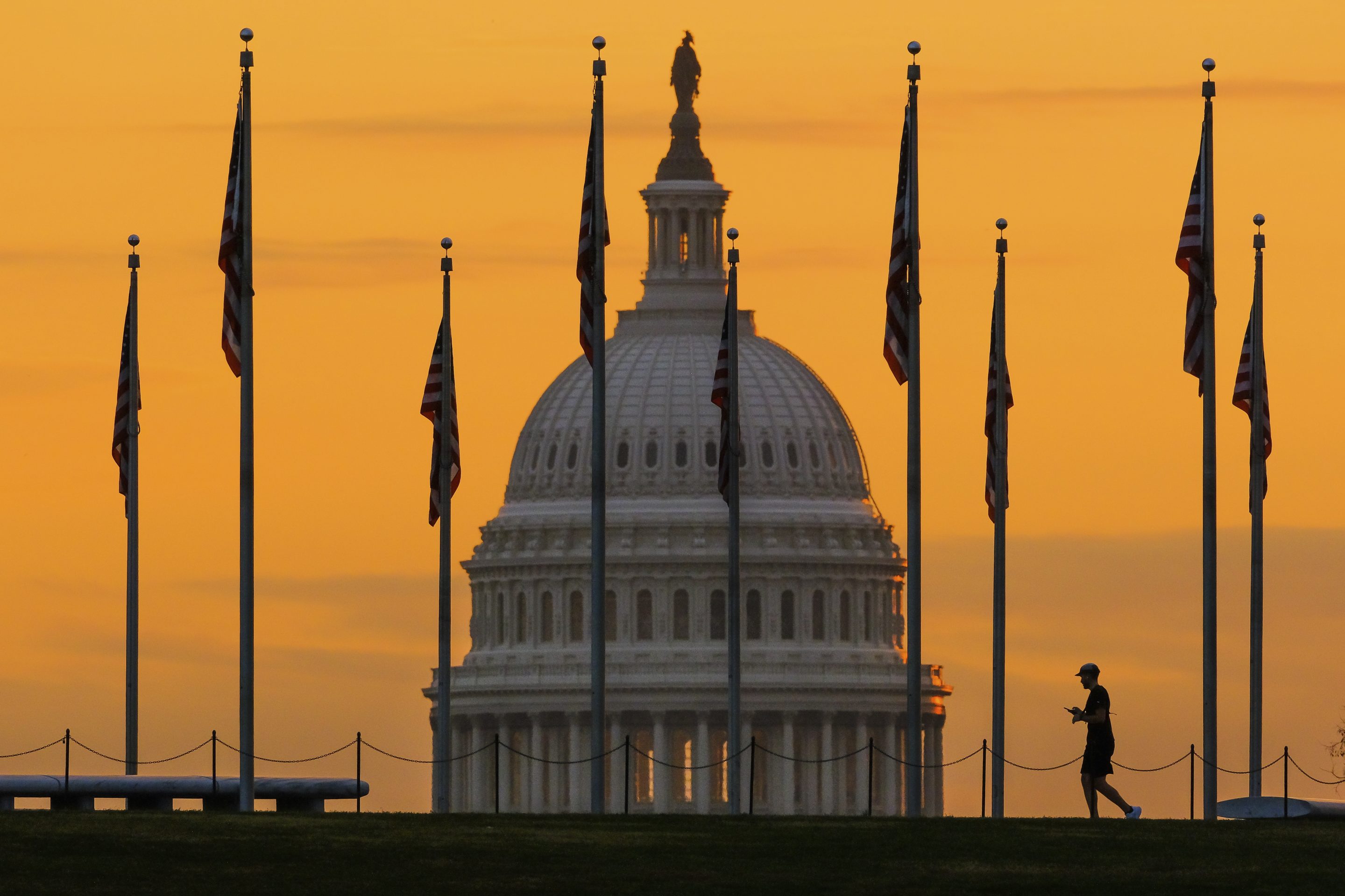 The U.S. Capitol Building looms behind flags on the National Mall in Washington Nov. 7, 2022. 